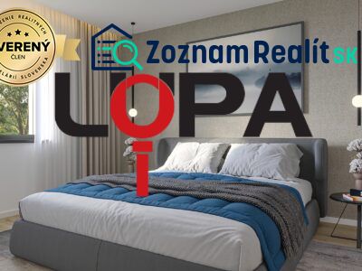 Bedroom in a family house with a large bed and a decorative wall.