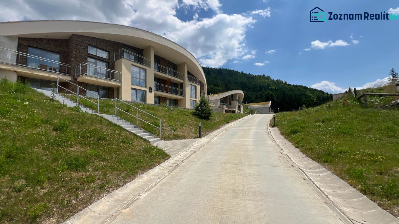 Recreational apartments at Tále in Horná Lehota with a natural background and blue sky.