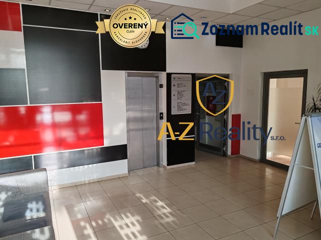 Office interiors with an elevator and a wall in red and black design.