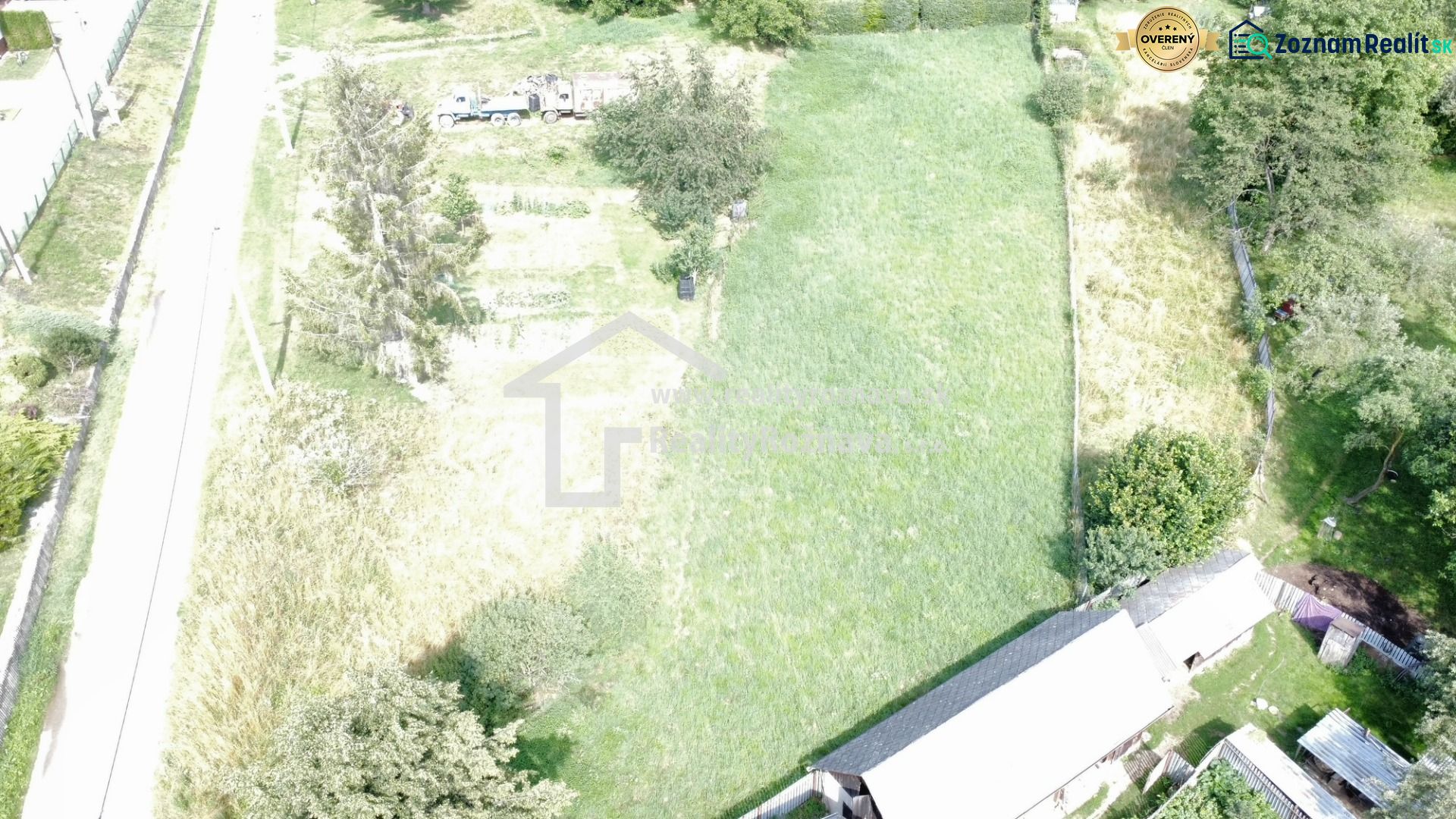 Aerial view of a green plot in Vlachovo, suitable for living.