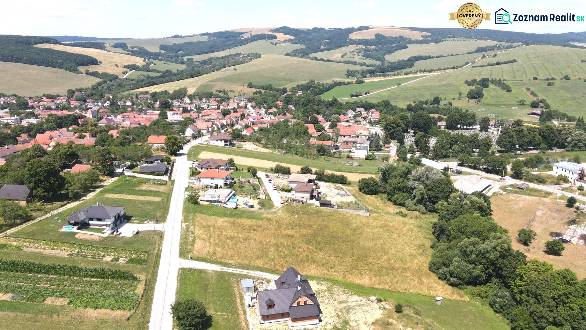 Aerial view of Vrbovce and Laski Street, residential plots surrounded by nature.