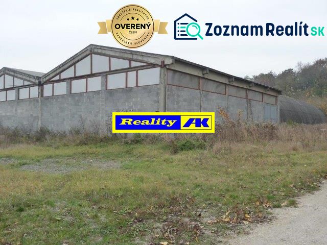 The exterior of warehouses and halls in Trnava, surrounded by a natural environment.
