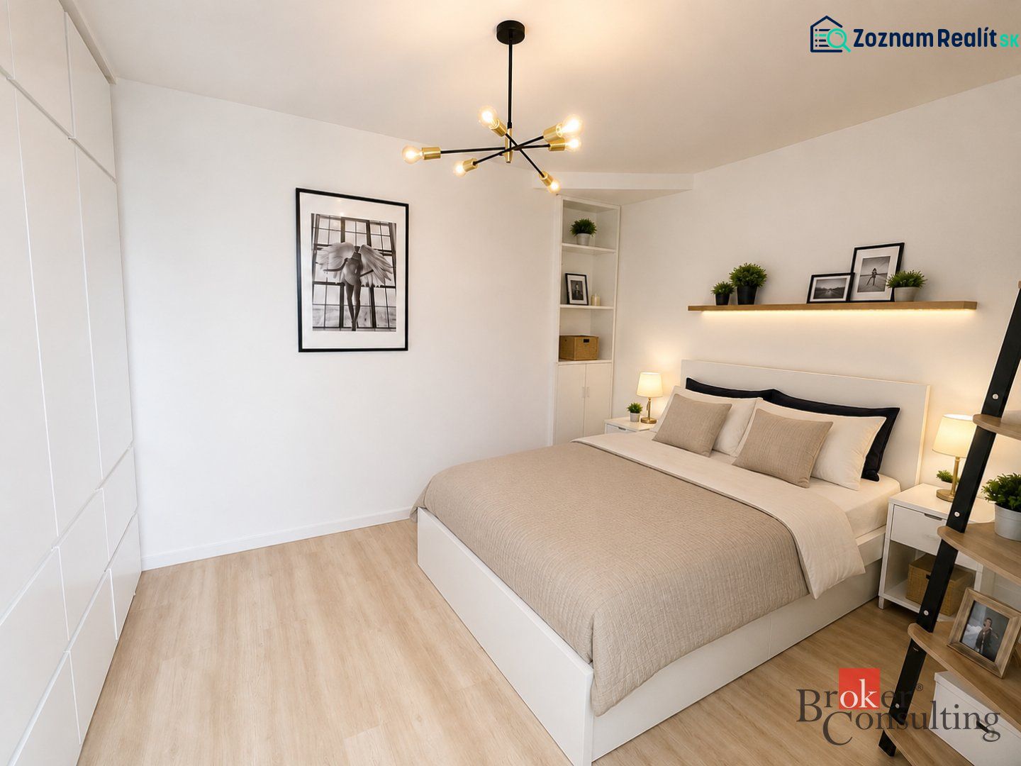 A bright bedroom with a bed, decor, a hanging lamp, and a wood-patterned floor in a studio apartment.