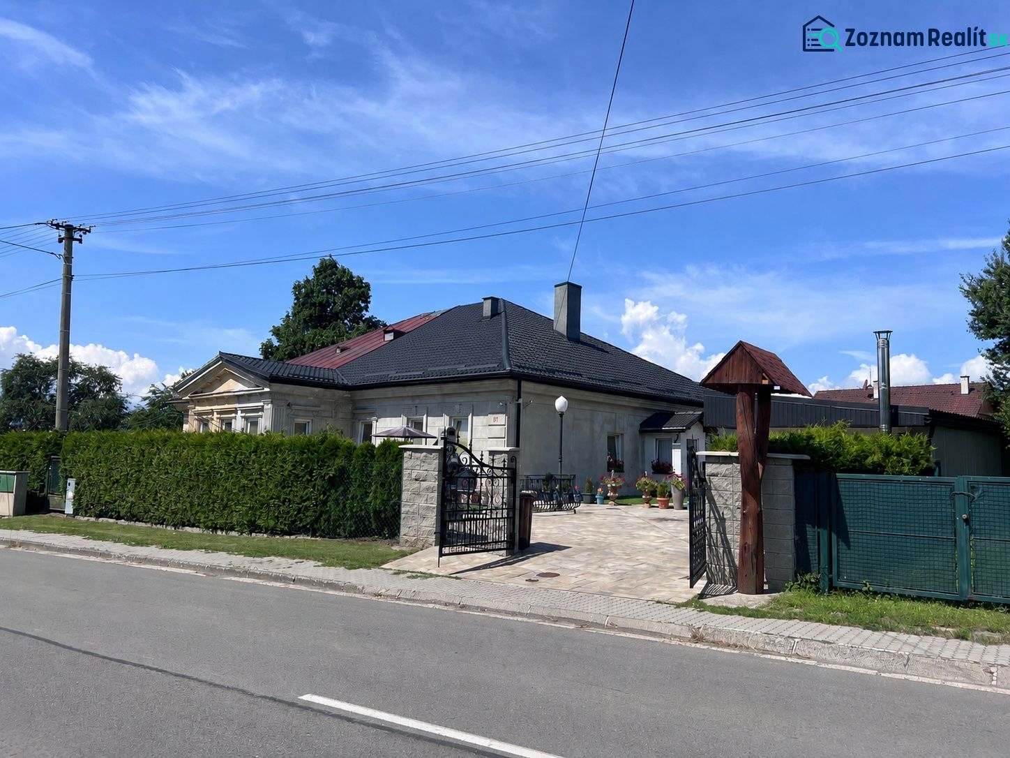 A family house on Ondrášovská Street in Liptovský Mikuláš with a landscaped garden.