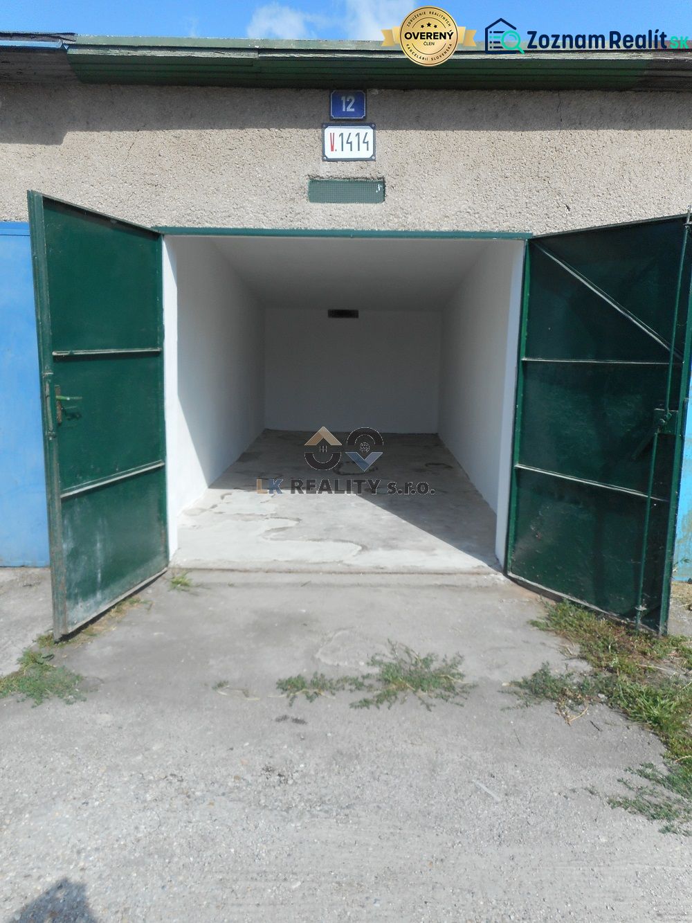 Open garages on Ľudovíta Stárka in Trenčín, with an empty interior and concrete floor.