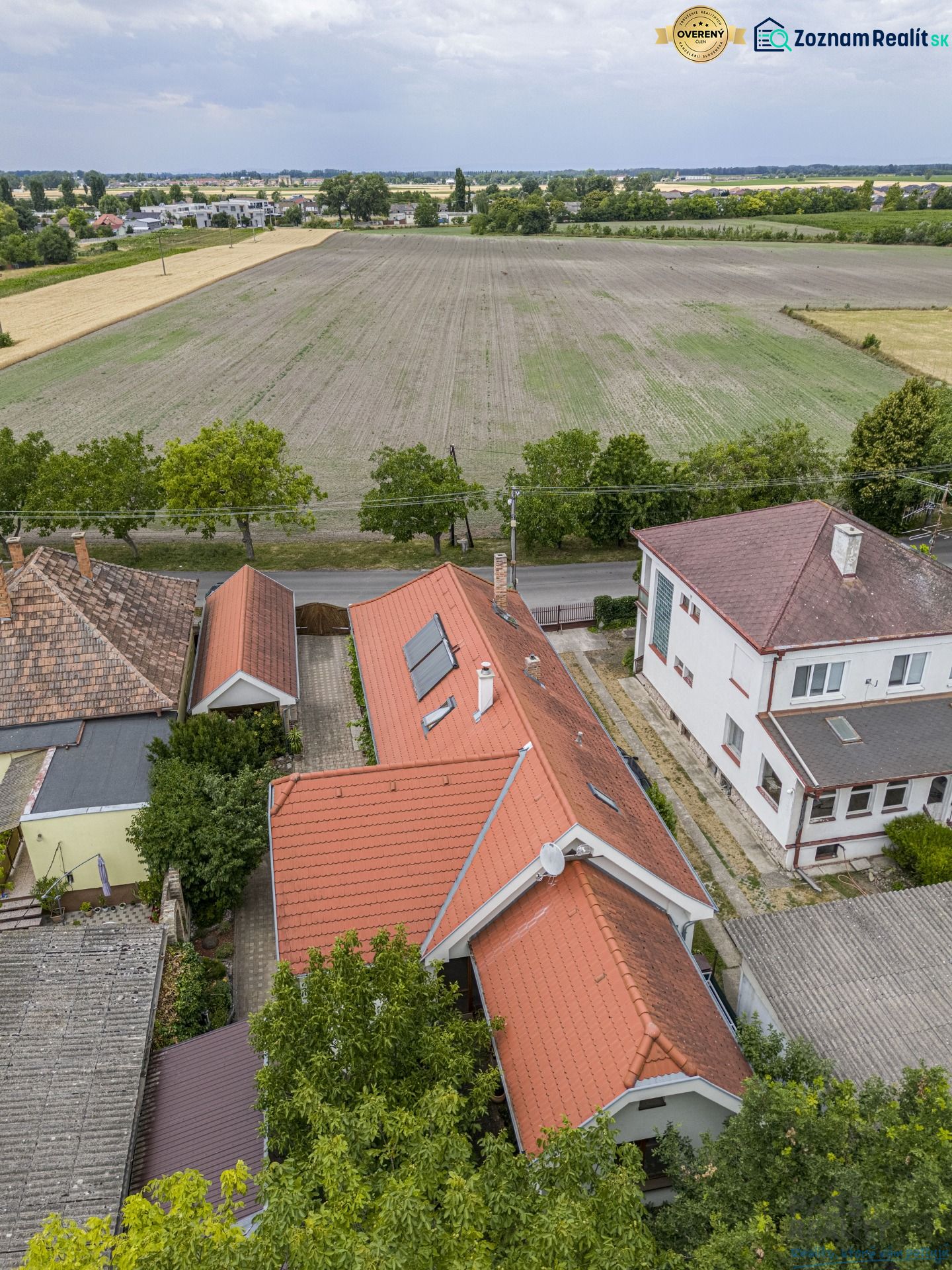 A family house on Čigérska Street in Dunajská Streda next to a vast field.
