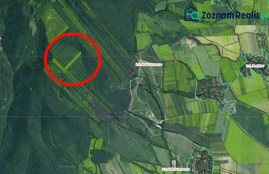 Aerial view of agricultural and forest lands in Veľké Ozorovce with a marked area.