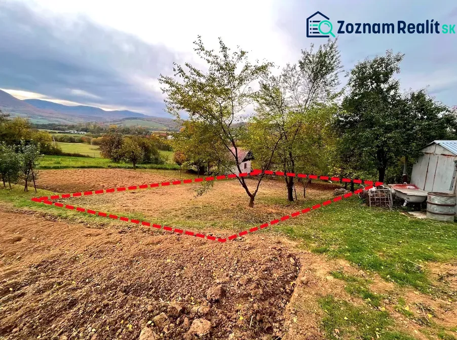 The natural scenery of gardens in Bystré with a marked plot and a country house.