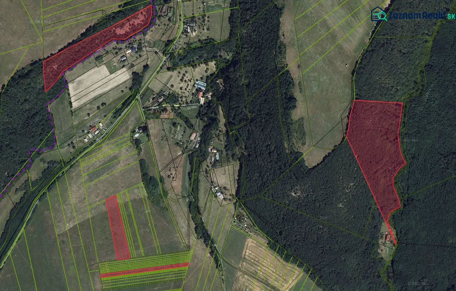 Aerial view of agricultural and forest lands around the village of Muľa.