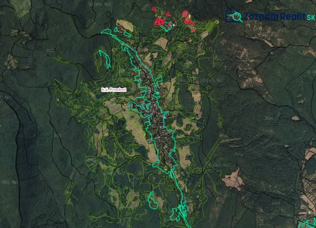 Aerial view of agricultural and forest lands in Prochot surrounded by dense forests.