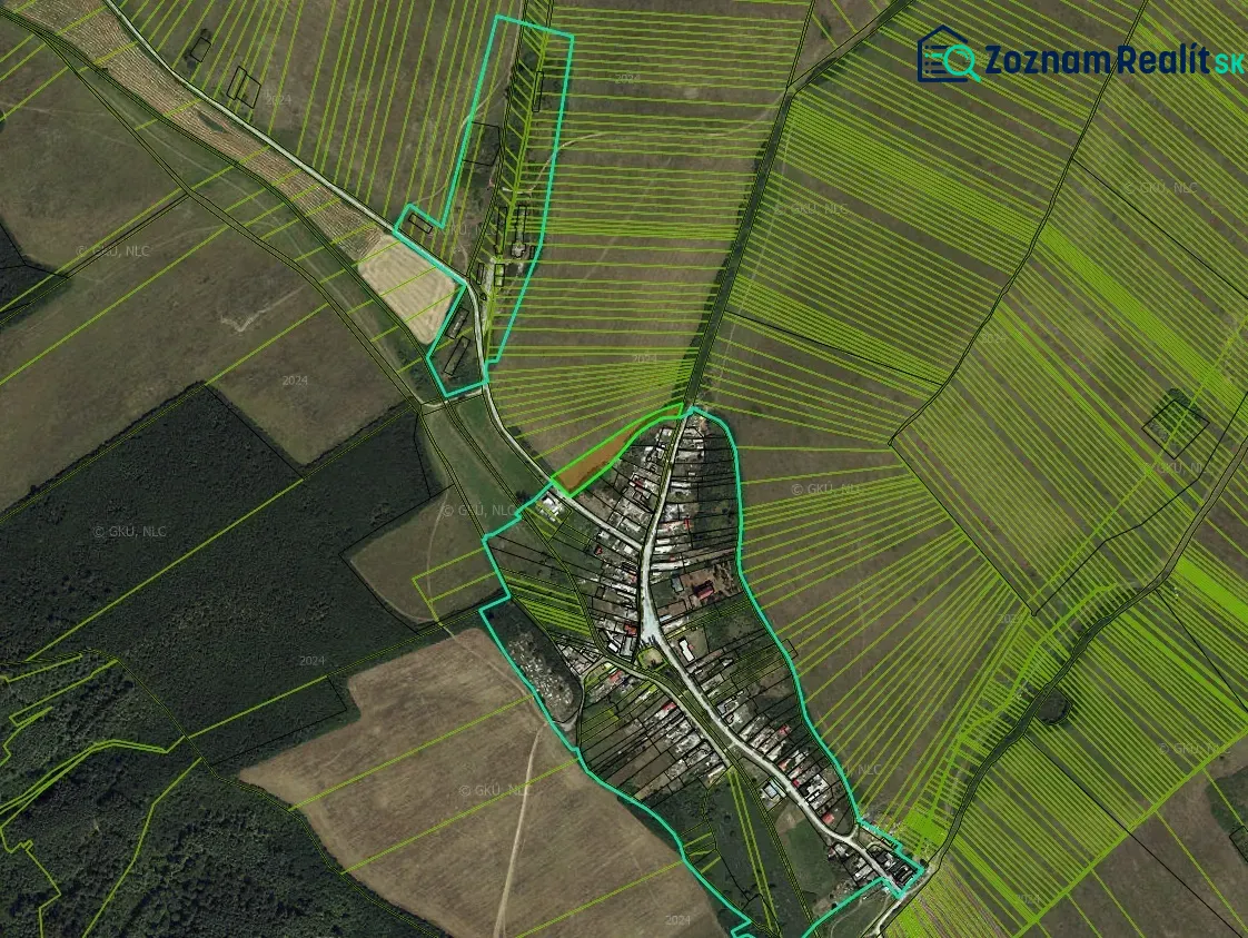 Aerial view of Barca with peculiar properties and surrounding fields.