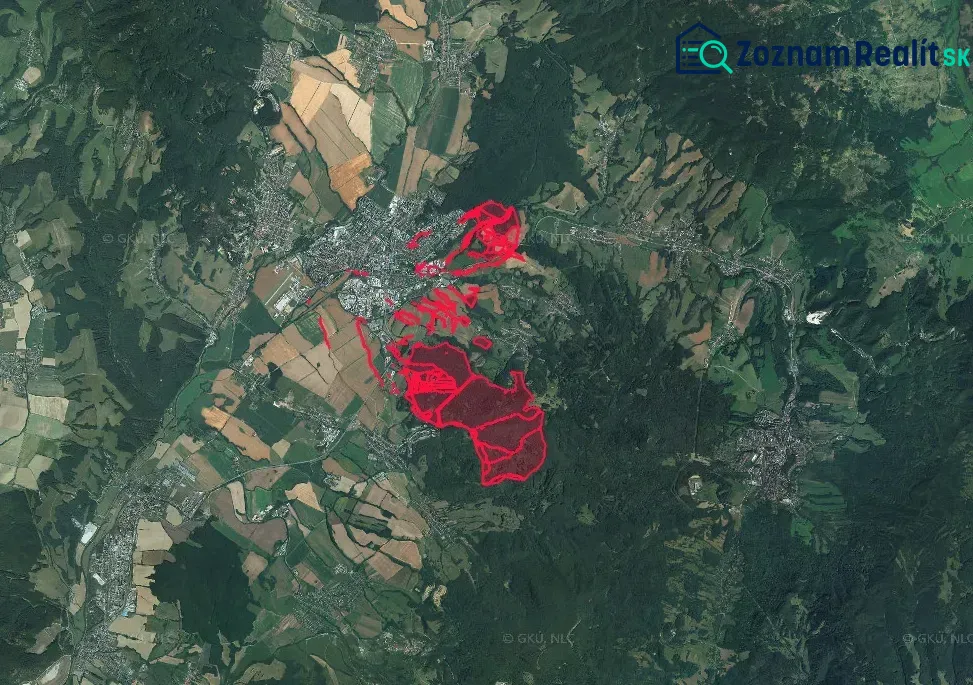 Aerial view of agricultural and forest lands around the city of Prievidza.