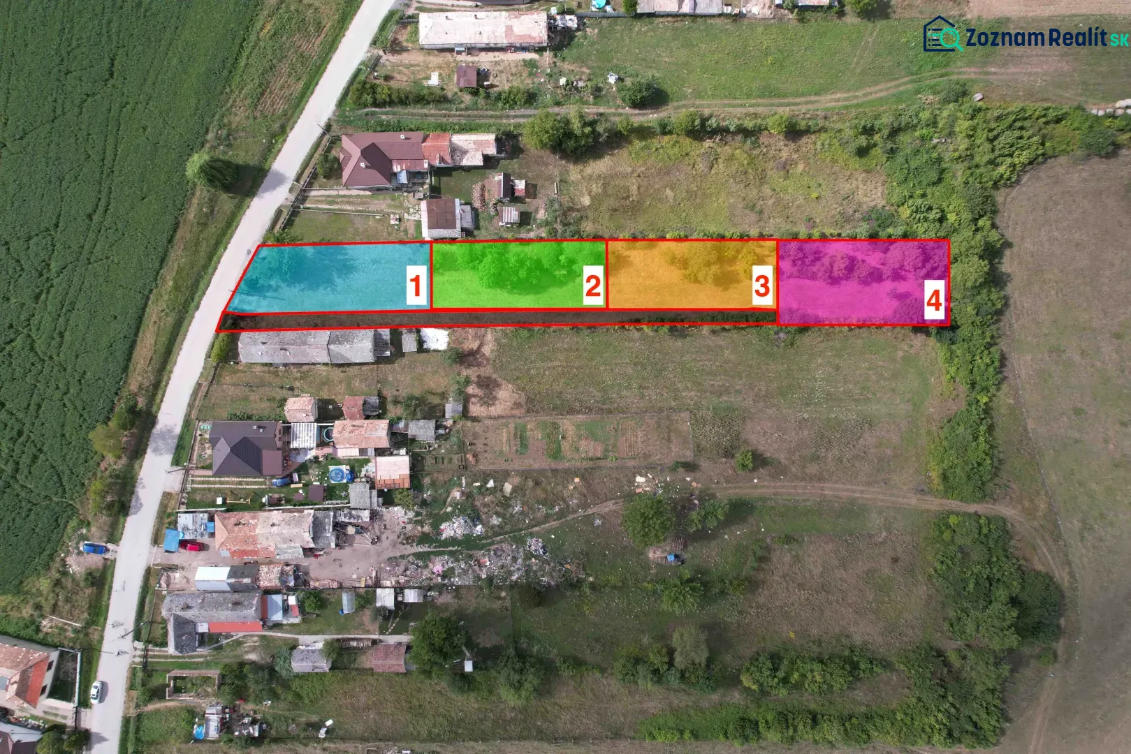 Residential plots in Rakytník divided into sections, surrounded by greenery.