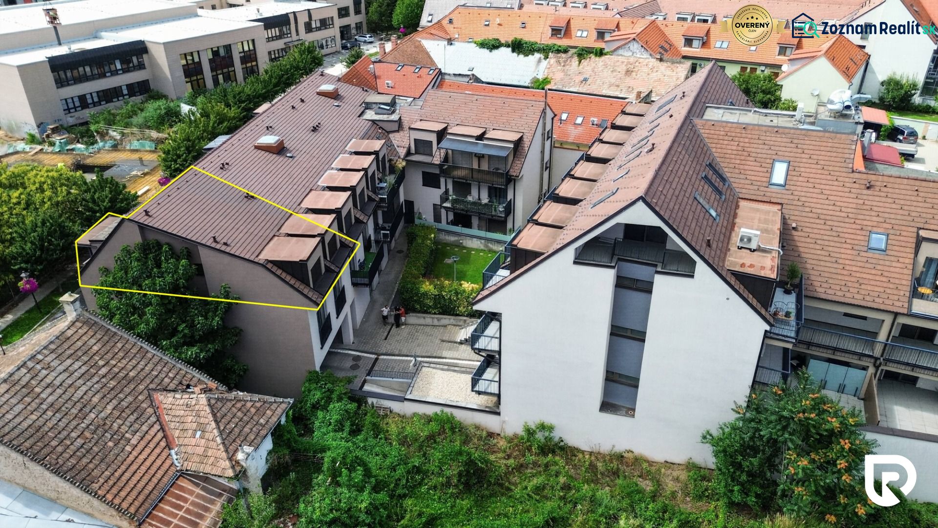 Apartment complex on Halenárska Street in Trnava with 3-bedroom apartments and greenery.