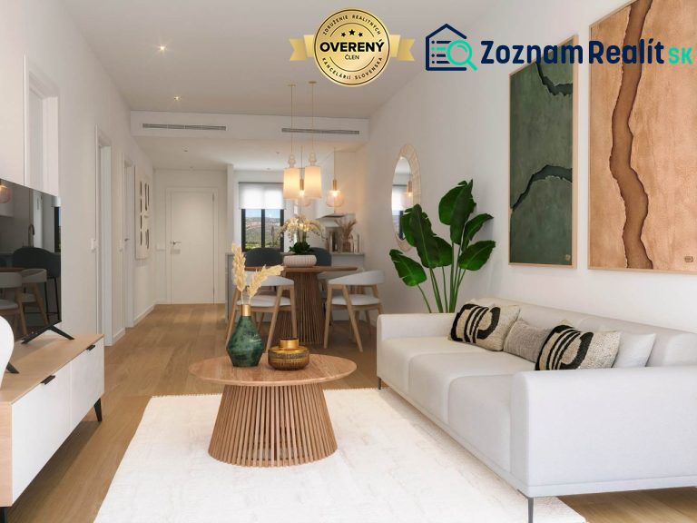 A bright living room in a three-room apartment with a wooden decor floor and stylish furniture.