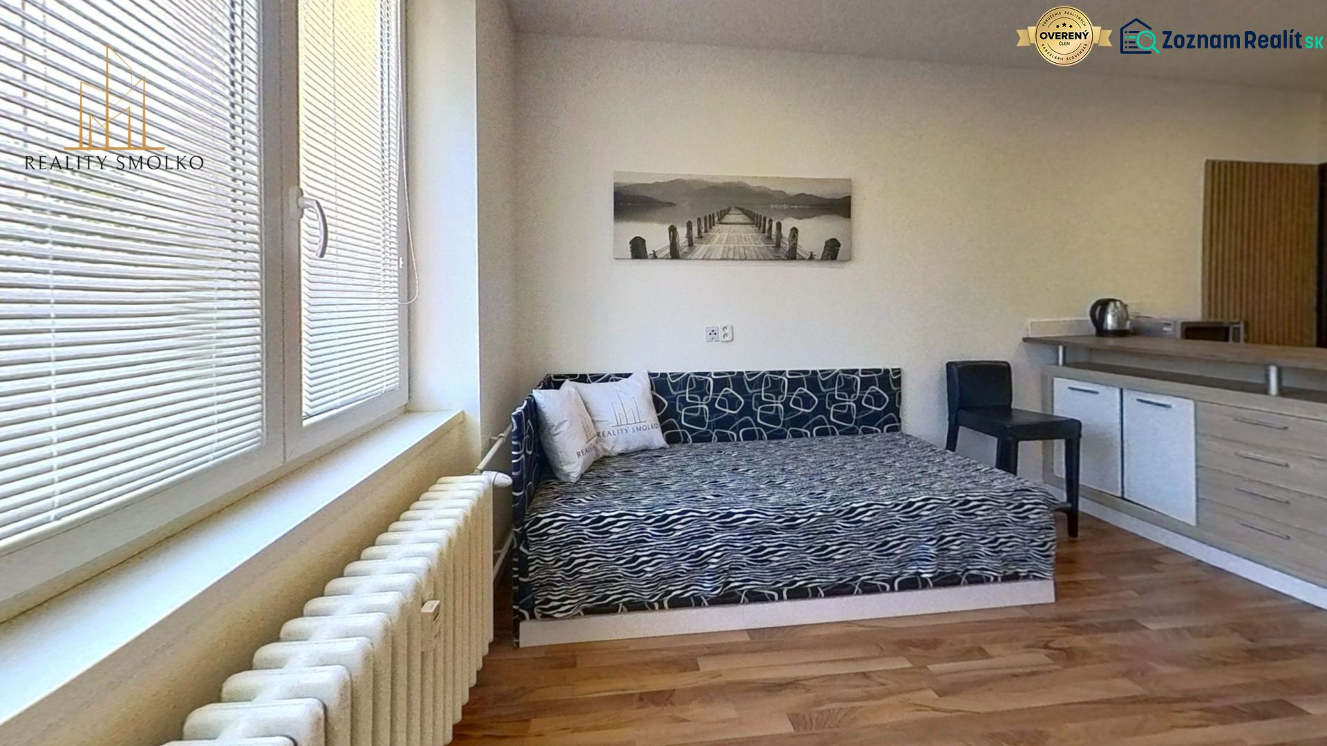 Recreational apartment with a sofa set and wooden decor flooring.