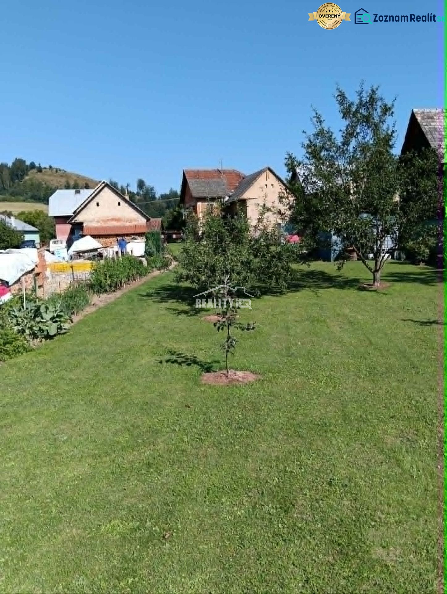 A garden with a lawn and fruit trees near houses in Ovčiarsko, Plots - living.
