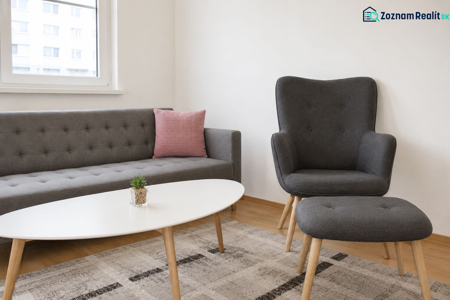Living room with a comfortable sofa and an armchair in a 2-room apartment.