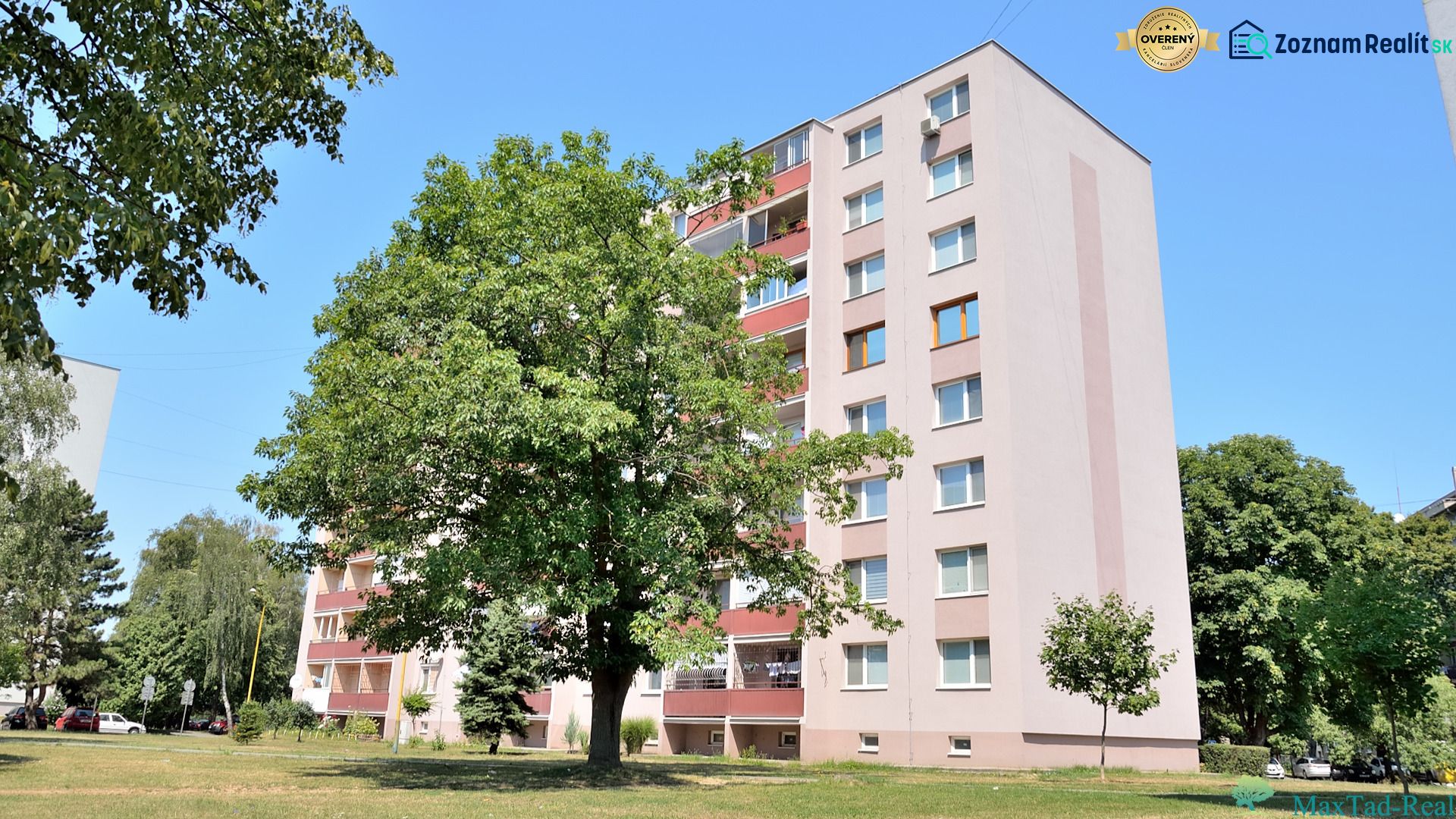 An apartment building with 3-room apartments on Martina Rázusa Street in Michalovce, surrounded by greenery.