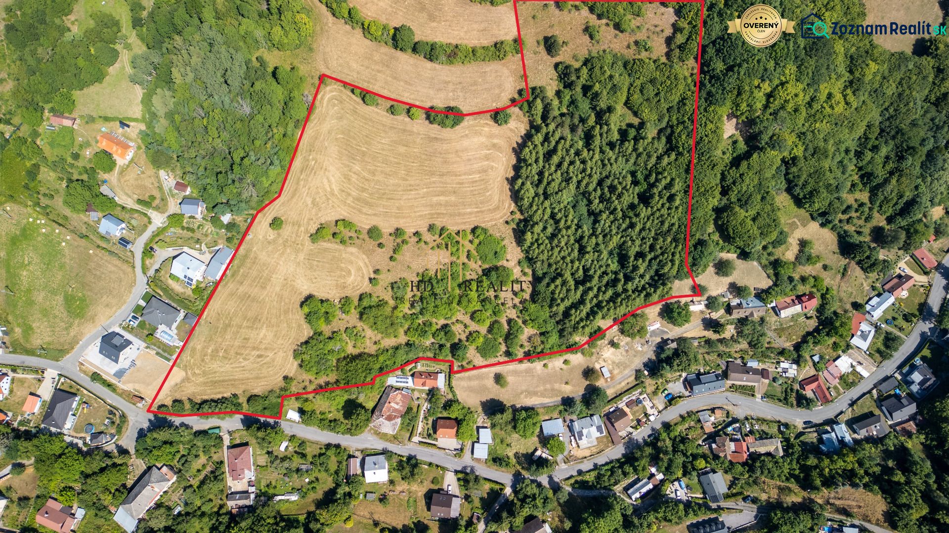Aerial view of the property in Banská Štiavnica on Obrancov Mieru Street, surrounded by forest.
