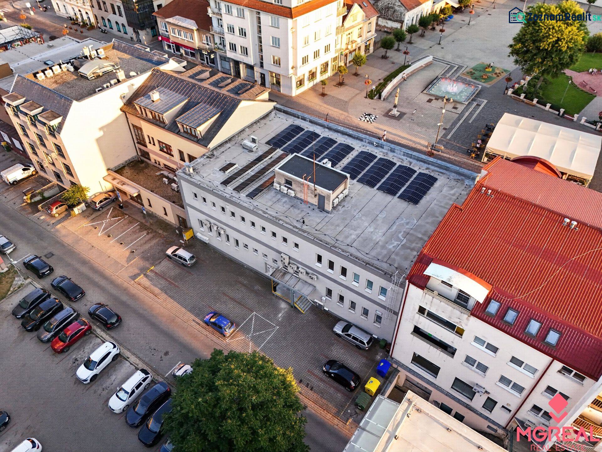 Aerial view of commercial premises on M.R. Štefánika Street in Topoľčany with a parking lot.