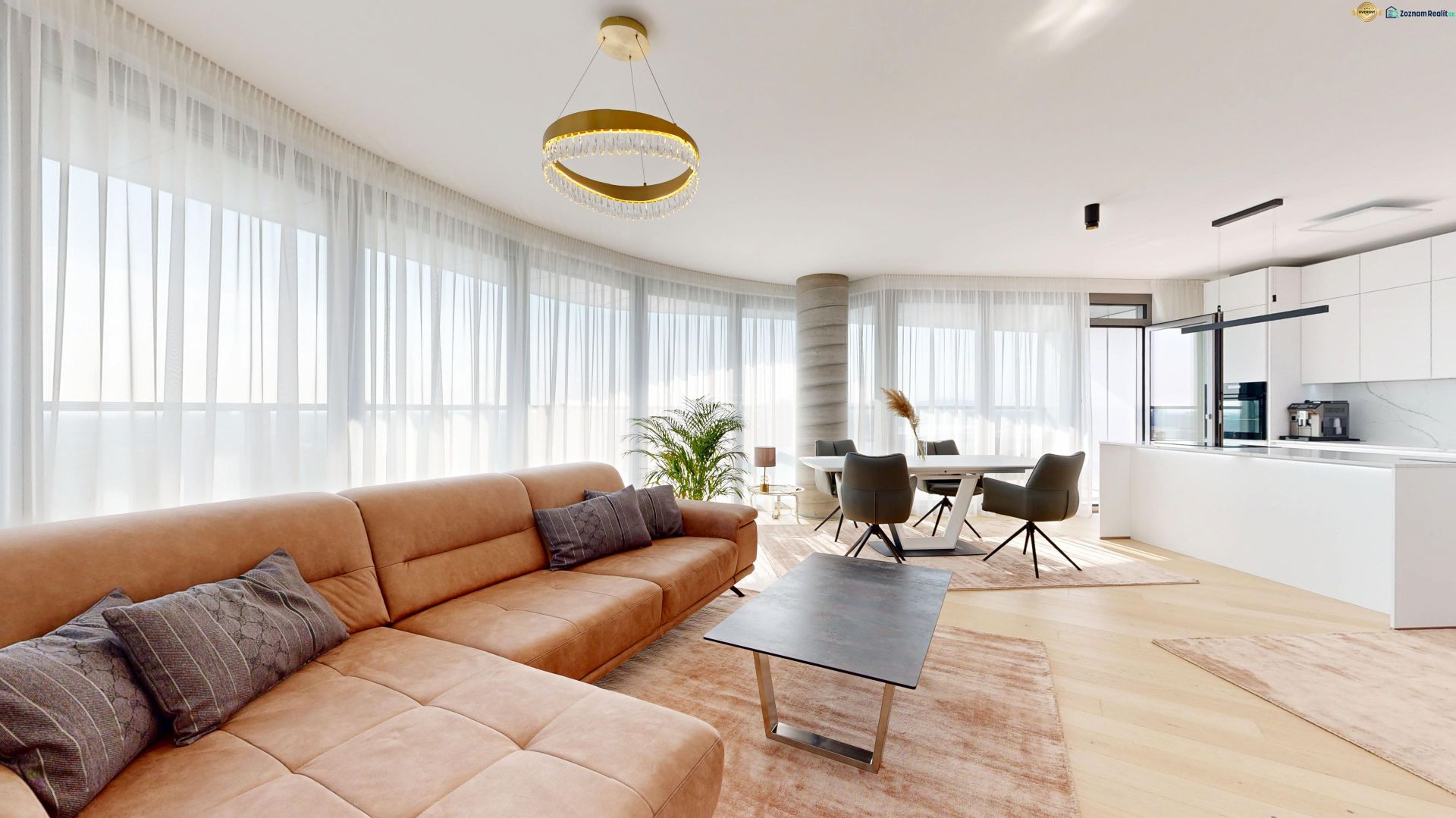 Living room in a 4-room apartment with a corner sofa and a floor with a wooden decor.
