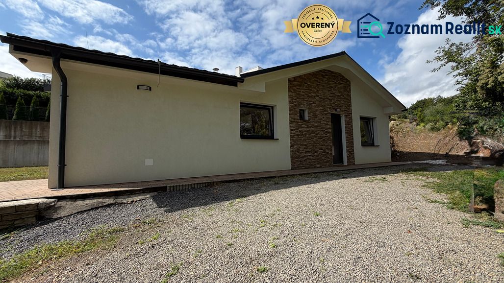 A family house on Zadarska Street in Banska Bystrica with stone cladding.