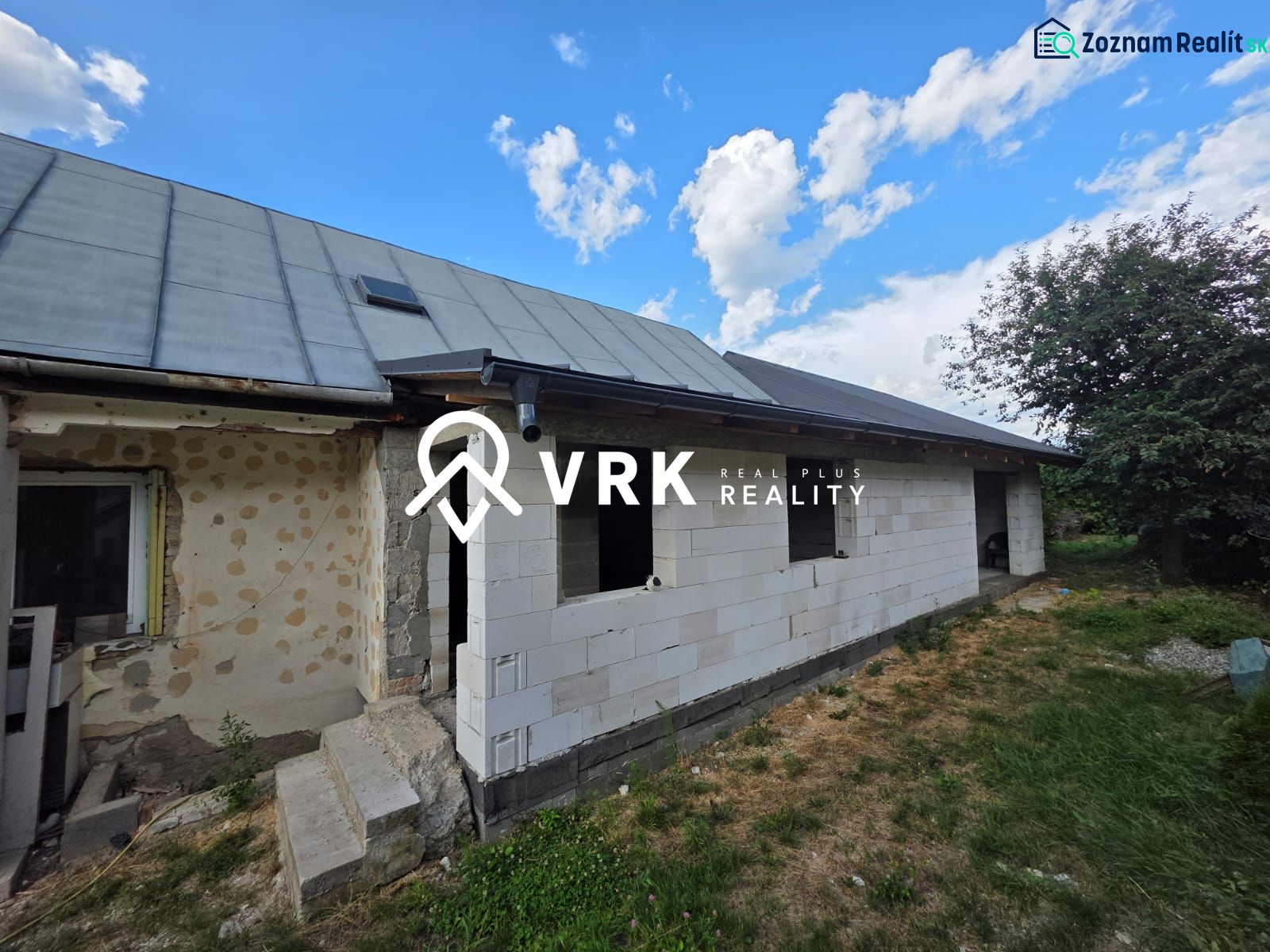 A family house in Kokšov-Bakša during renovation with incomplete facade cladding.
