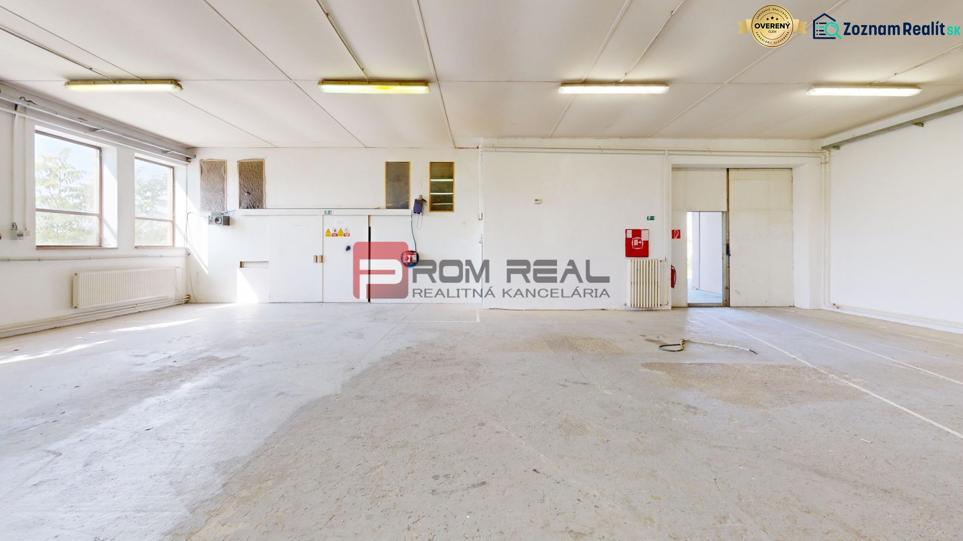 Bright production spaces with large windows and white walls.