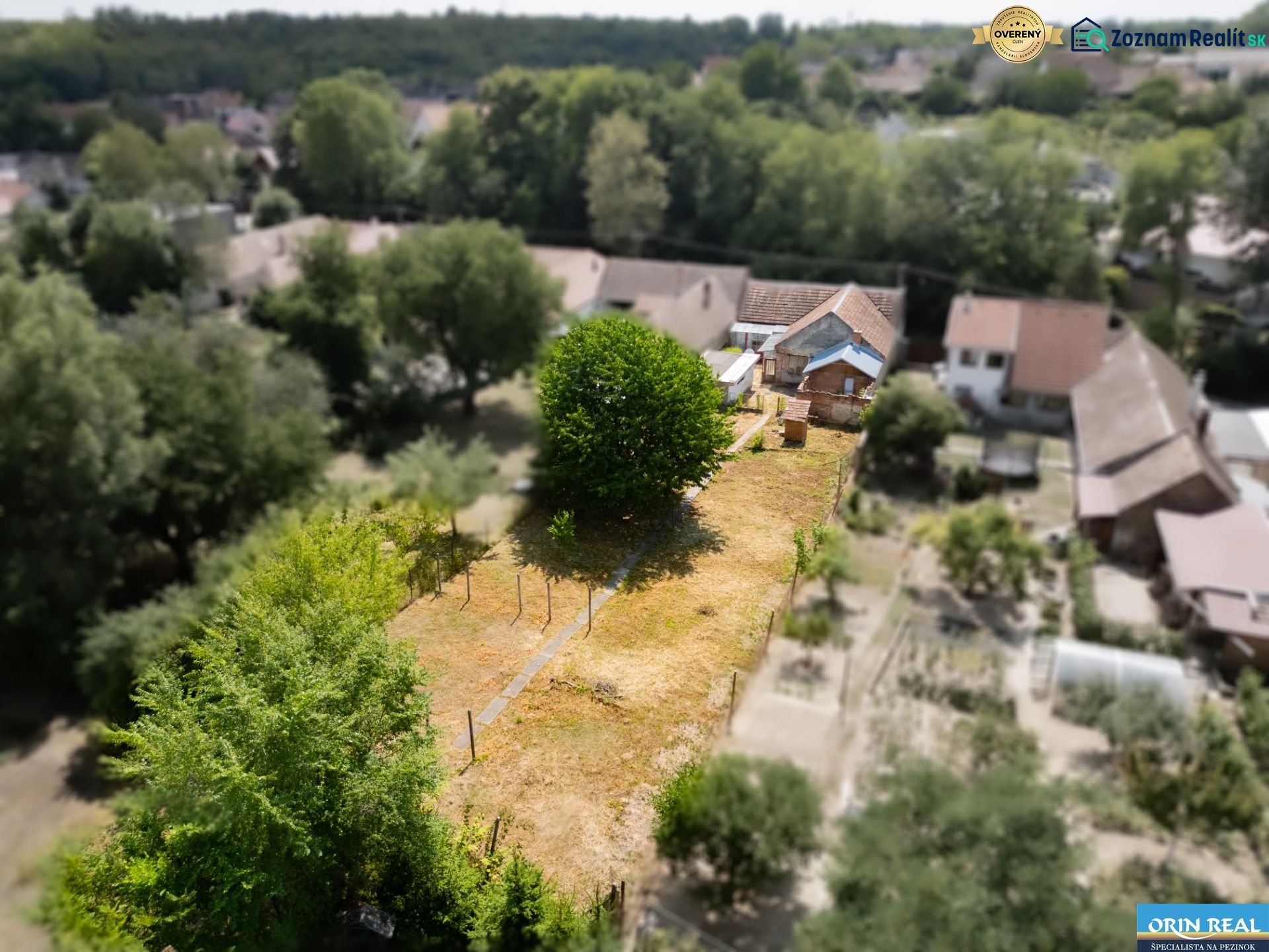 A view of the garden at the family house on Vištuk 158 street in the town of Vištuk.
