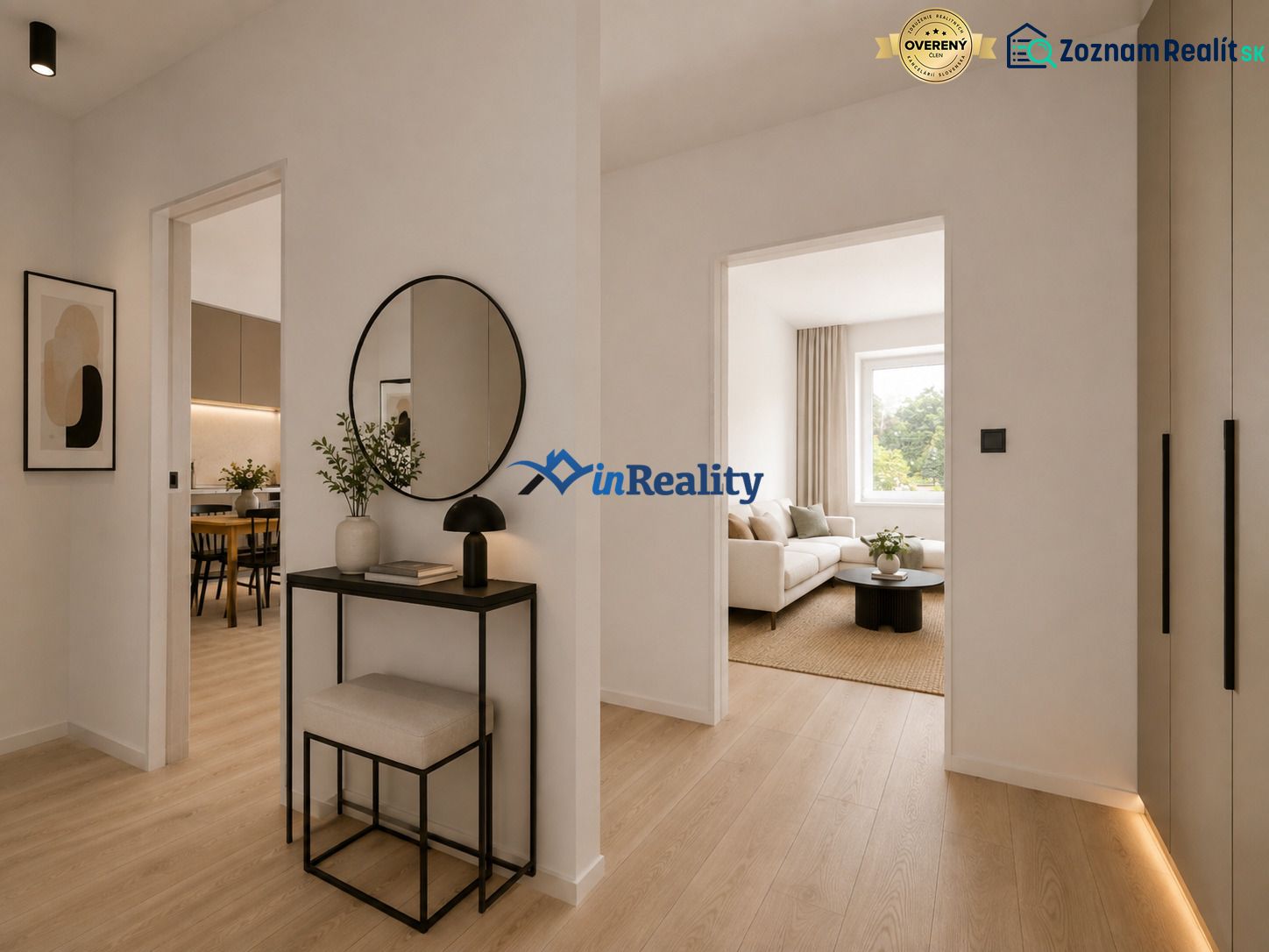 Interior of a 3-room apartment with a wooden decor floor and a mirror on the wall.