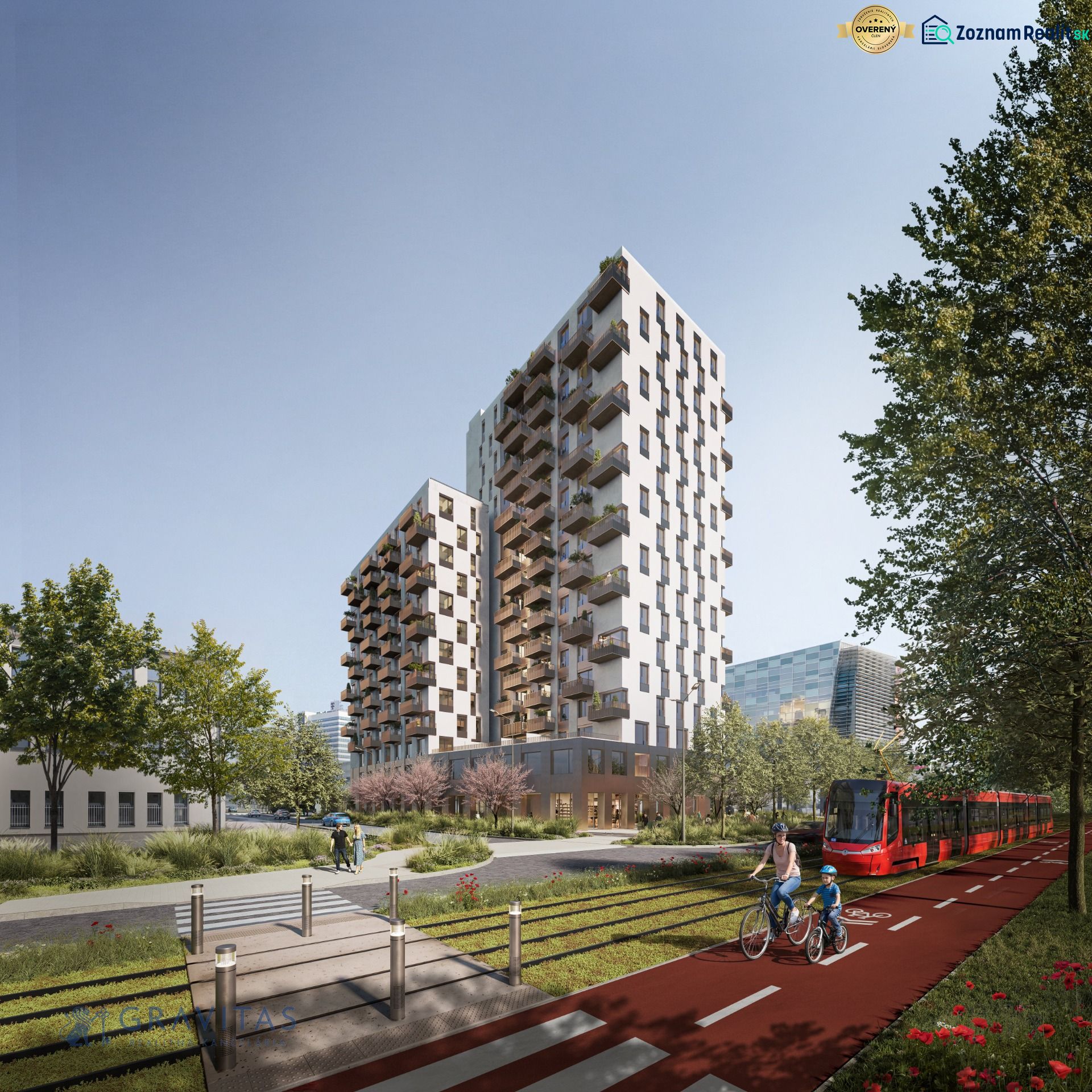 New building with balconies, cyclist and tram on Mlynské Nivy in Bratislava-Ružinov.