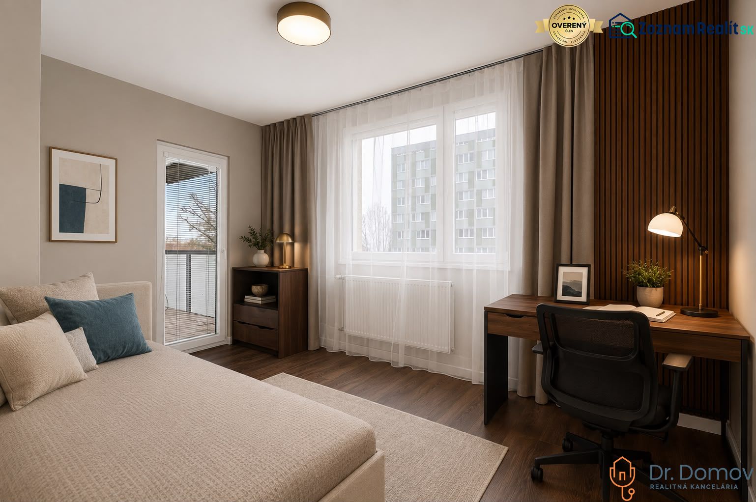 A spacious room in a 3-room apartment with a desk and a floor with a wooden decor.