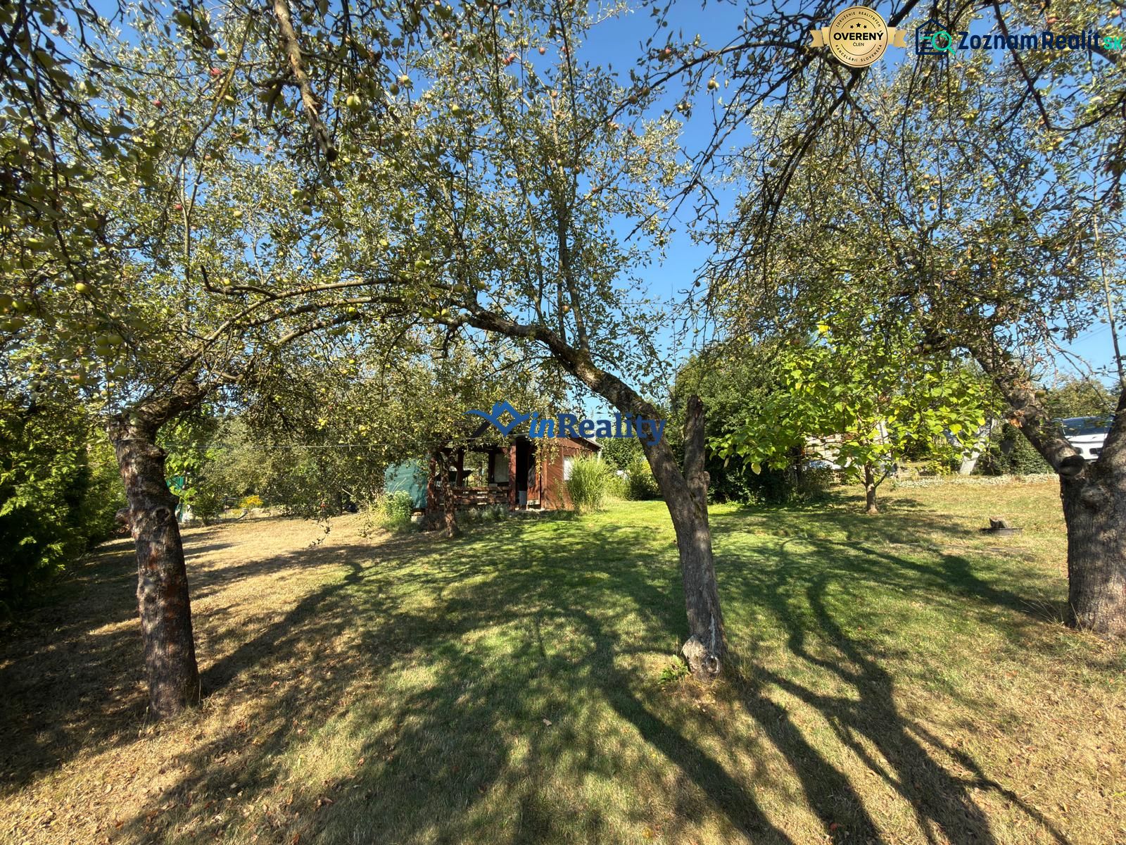 A garden with fruit trees near the cottage on Vinica Street in Lučenec.