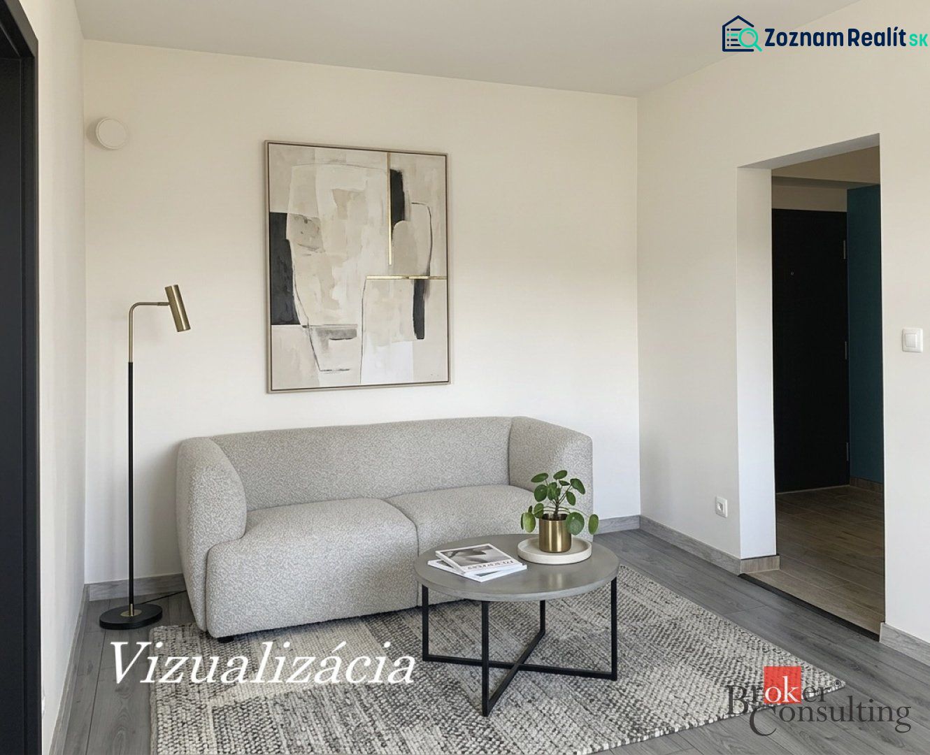 A room in a one-room apartment with a couch, a painting, and a floor with a wood decor.
