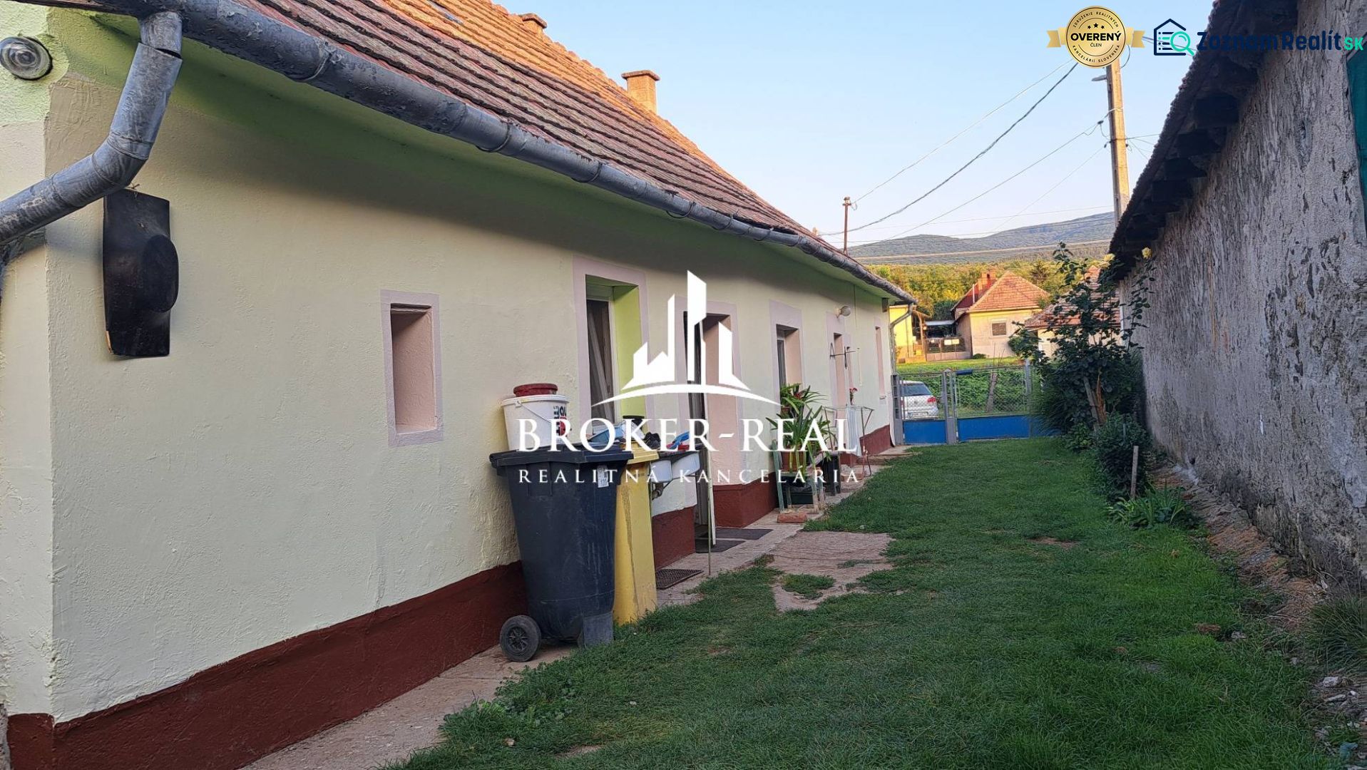 A family house in Gönc with a traditional roof and a landscaped exterior in a quiet street.