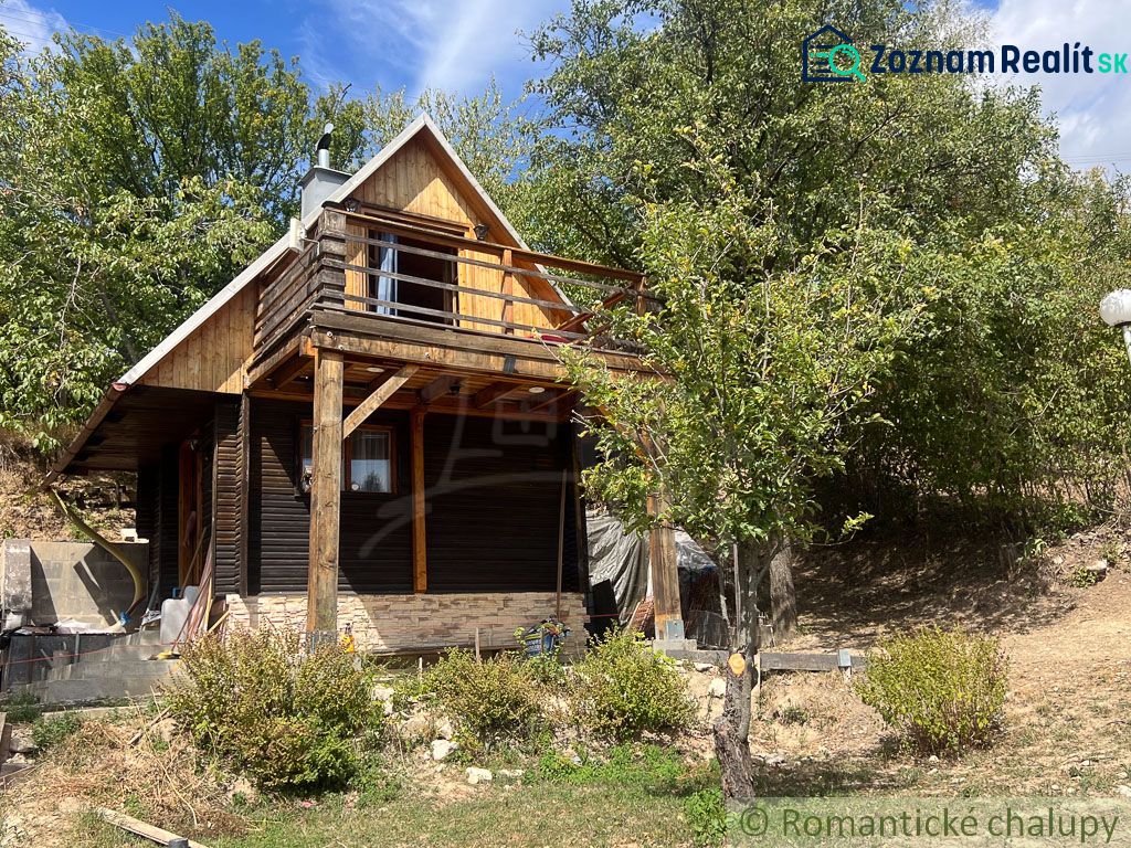 A cottage in Bratislava IV surrounded by trees in picturesque nature.