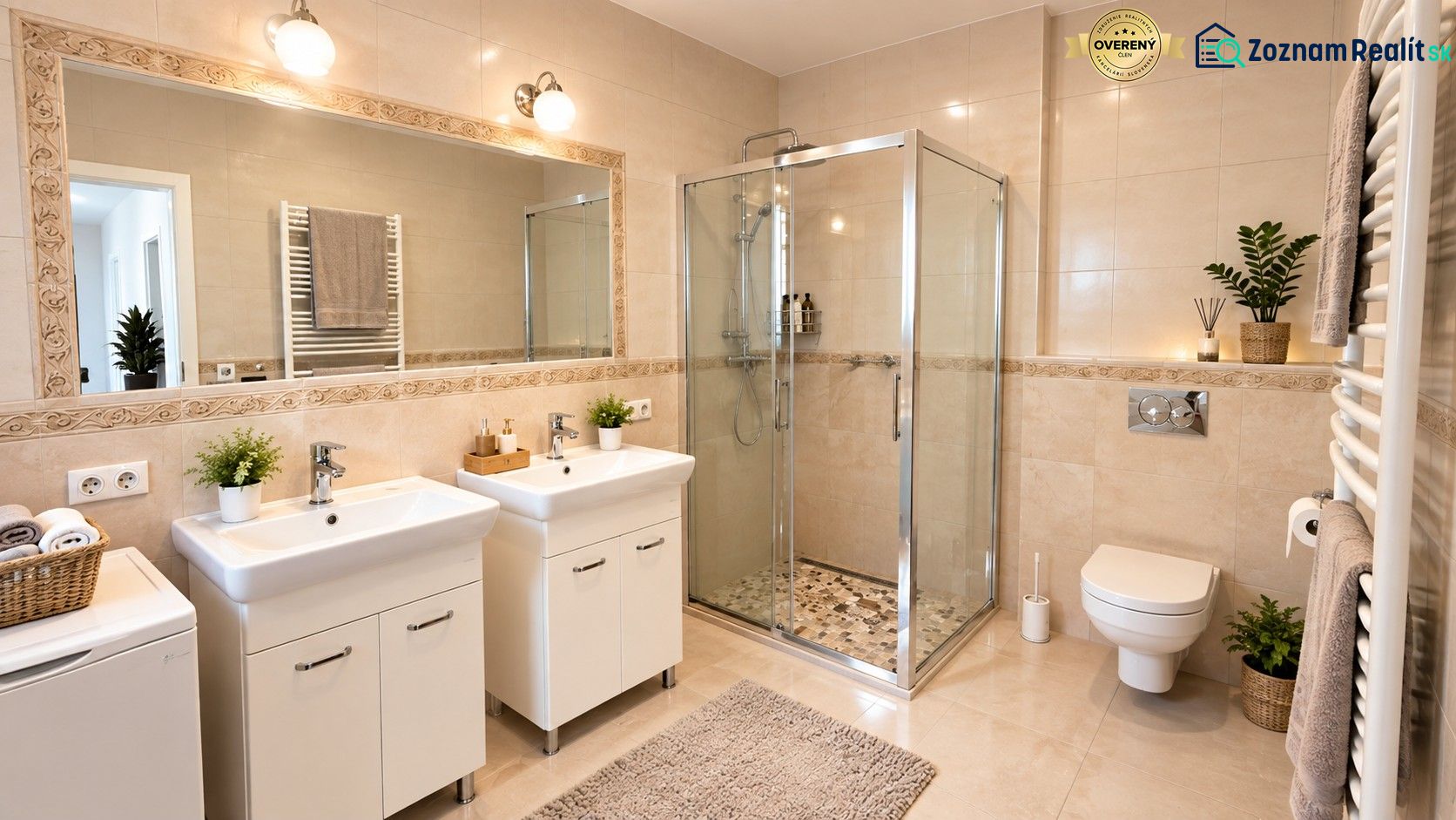 A bathroom with two sinks, a shower corner, and decorative tiles in a family house.
