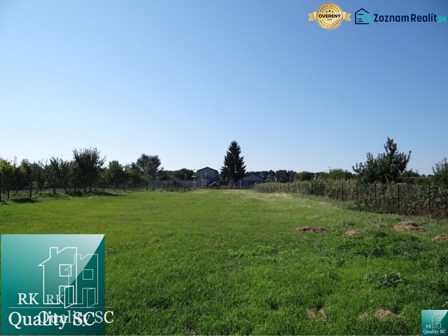 Residential plots on Vrbová Street in Jelka with a green grassy area.