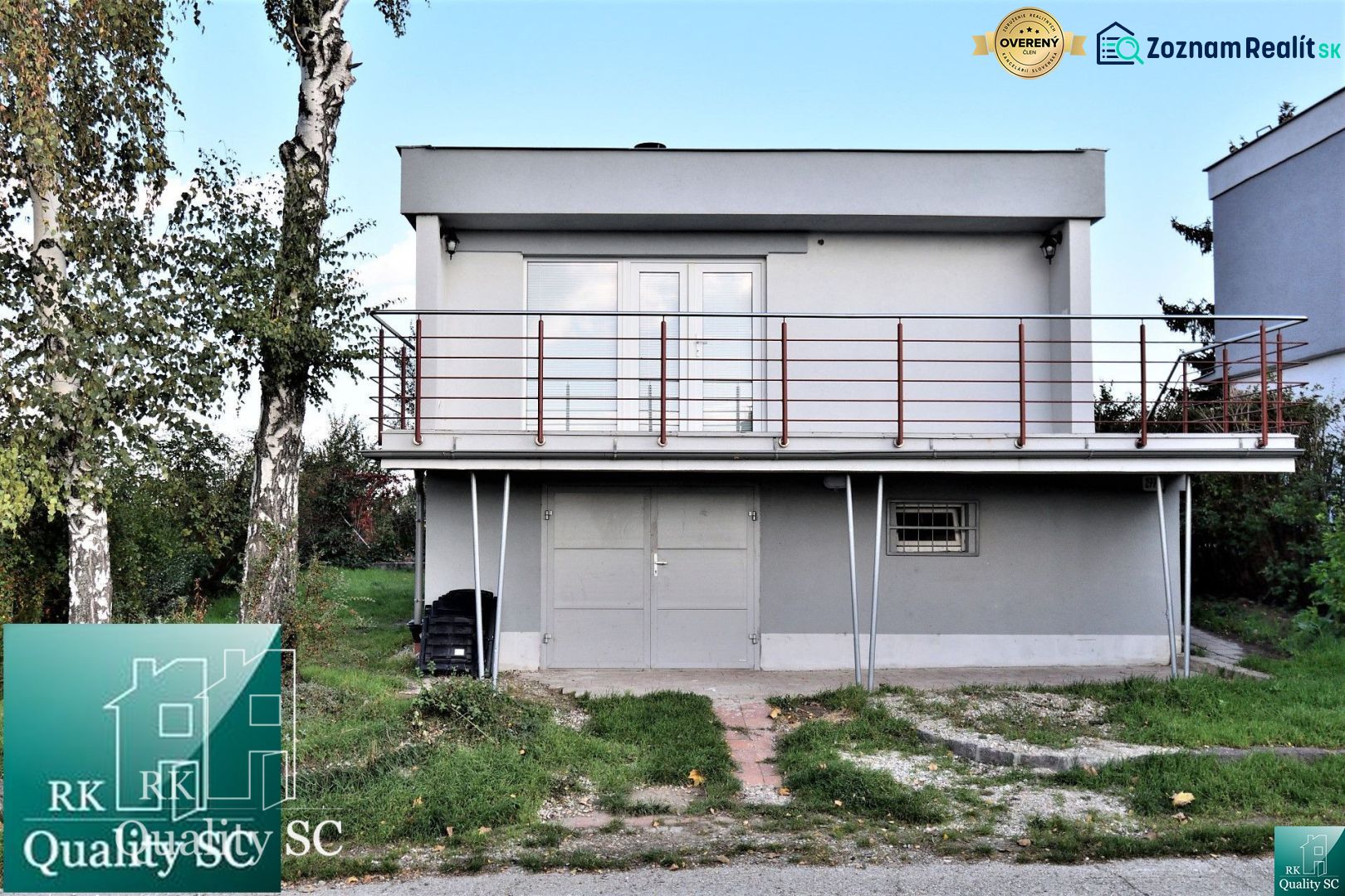 Cottage at the SUNNY LAKES SOUTH in Senec with a green lawn and an outdoor staircase.