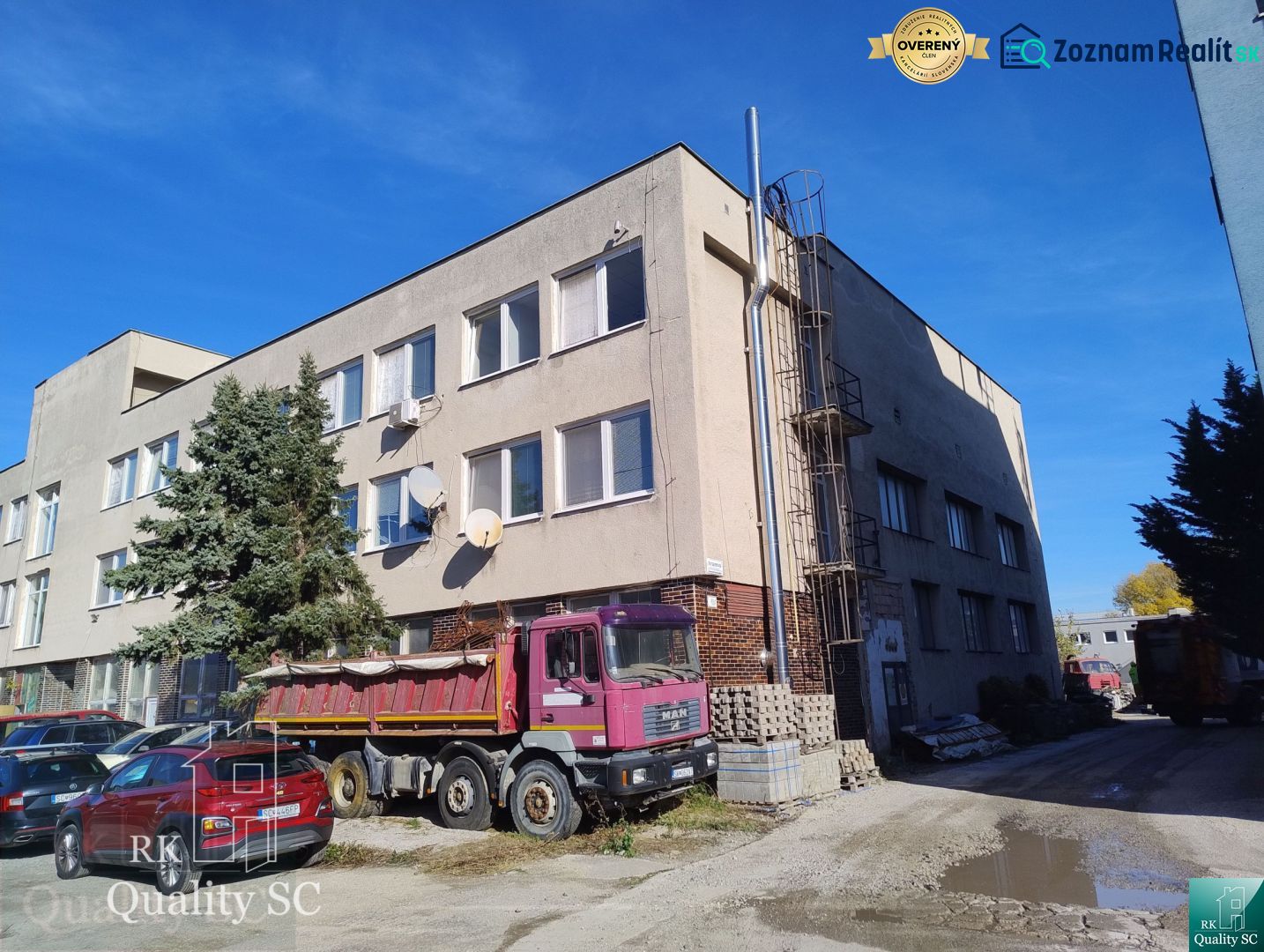 Building and truck on Staviteľská Street in Bratislava III, in the Warehouses and Halls section.