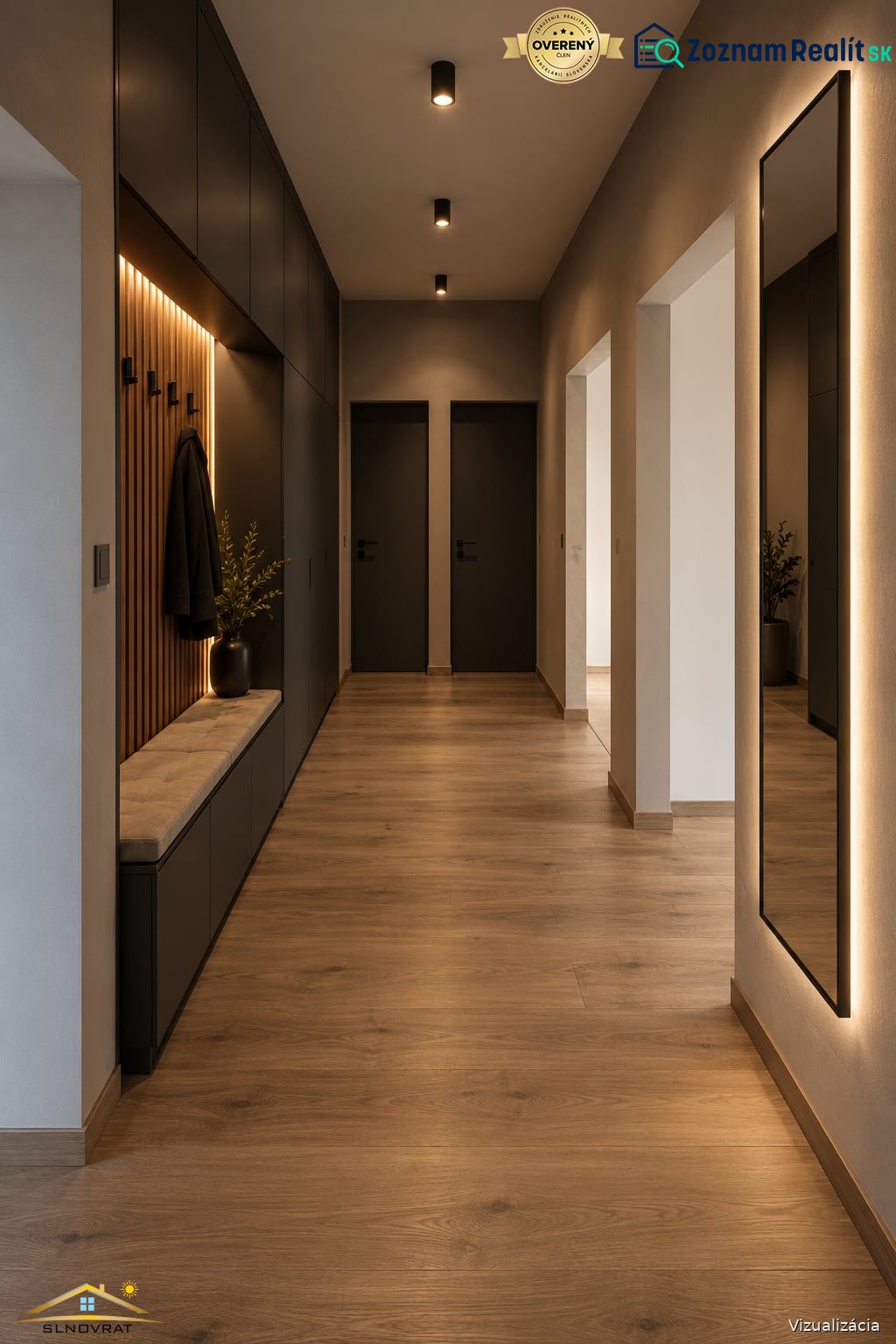 The hallway in a 3-room apartment with a wooden decor floor, black doors, and lighting.
