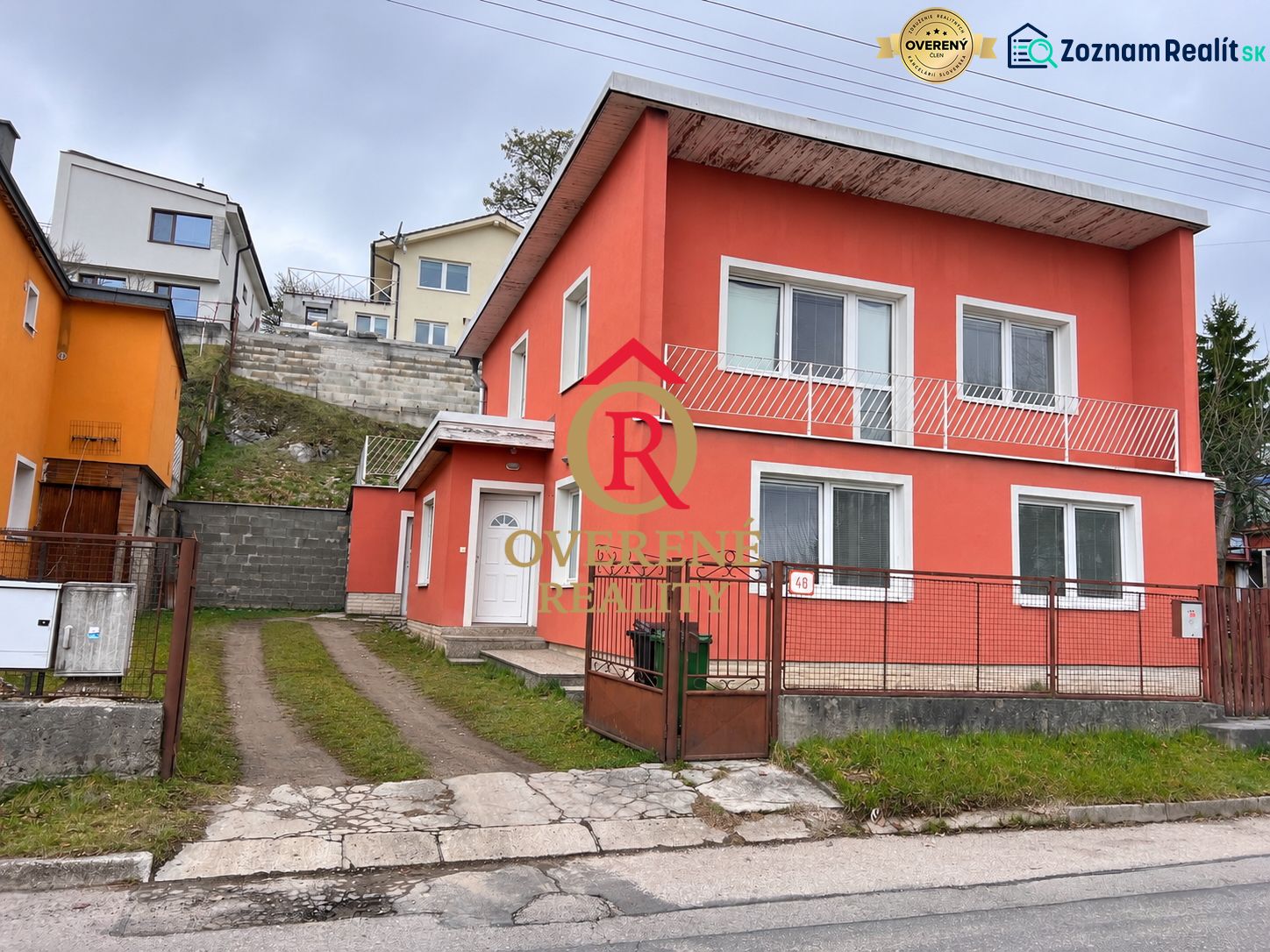 The family house on K. Sidora Street in Ružomberok has an orange facade and white window frames.