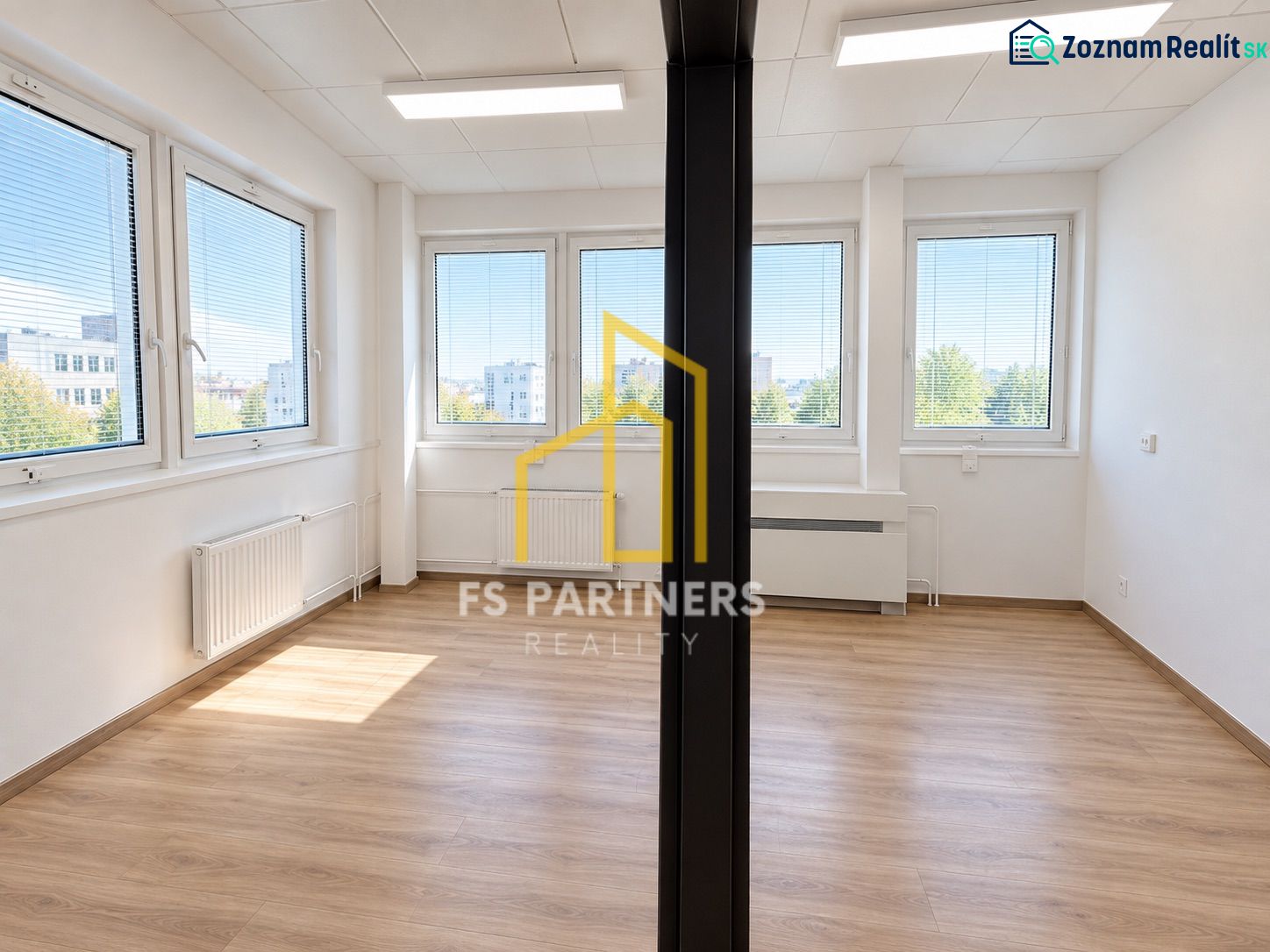 Offices with five windows and a wooden decor floor, FS Partners Reality.
