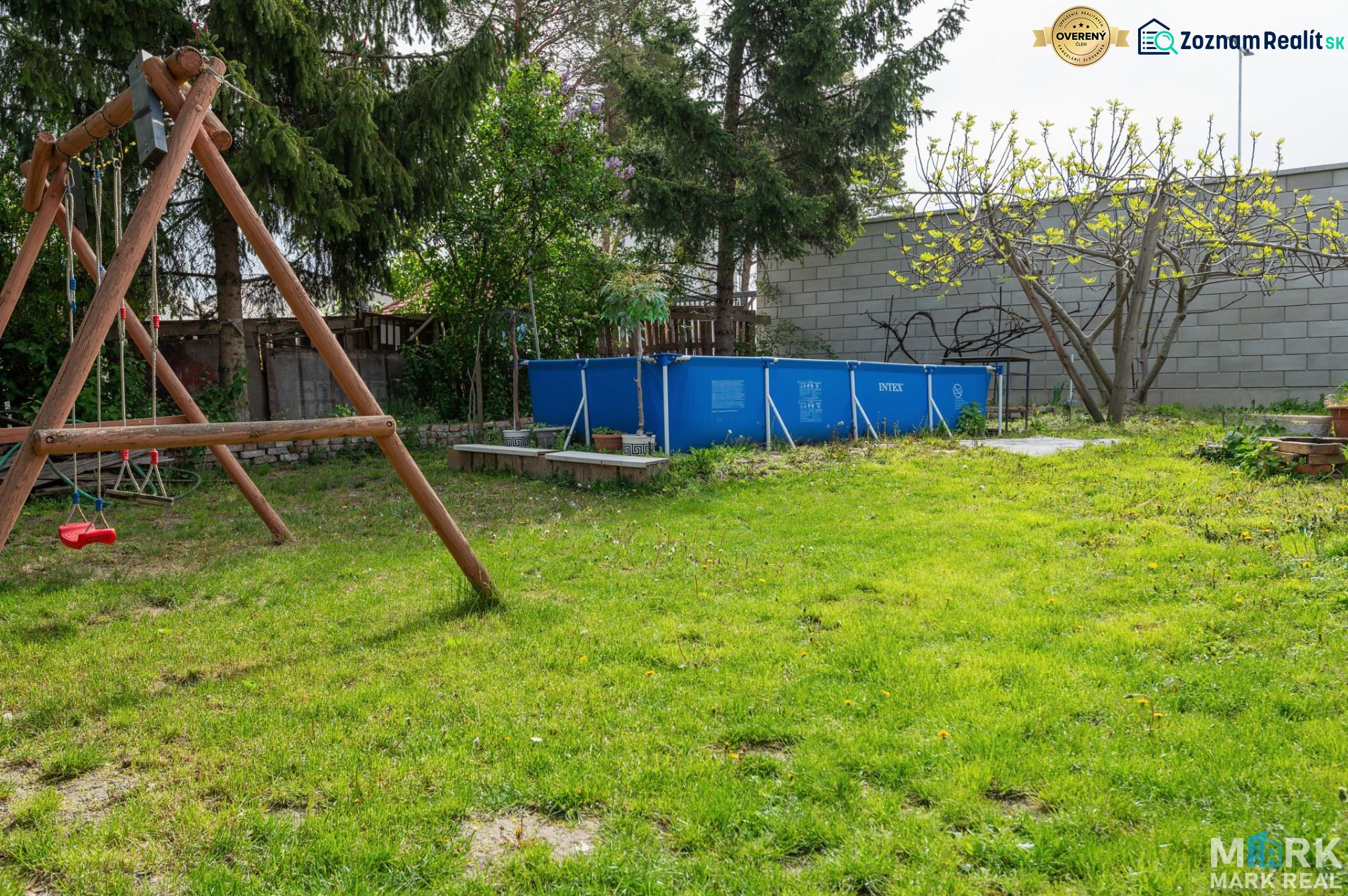 Garden in Dunajská Lužná, Kováčska, with a swing and a pool, ideal for residential plots.