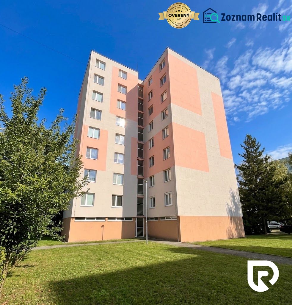 Apartment building on Žilinská in Trenčín with a diverse exterior and lawn.