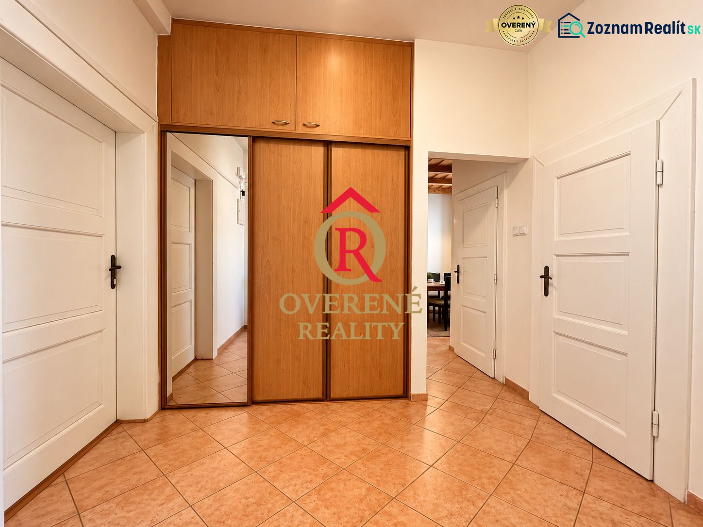 2-room apartment with tiles, a built-in wardrobe, and white doors.