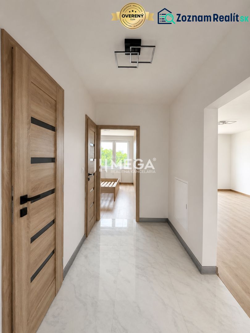 A hallway in a 3-room apartment with wooden doors and a floor with a wooden decor.