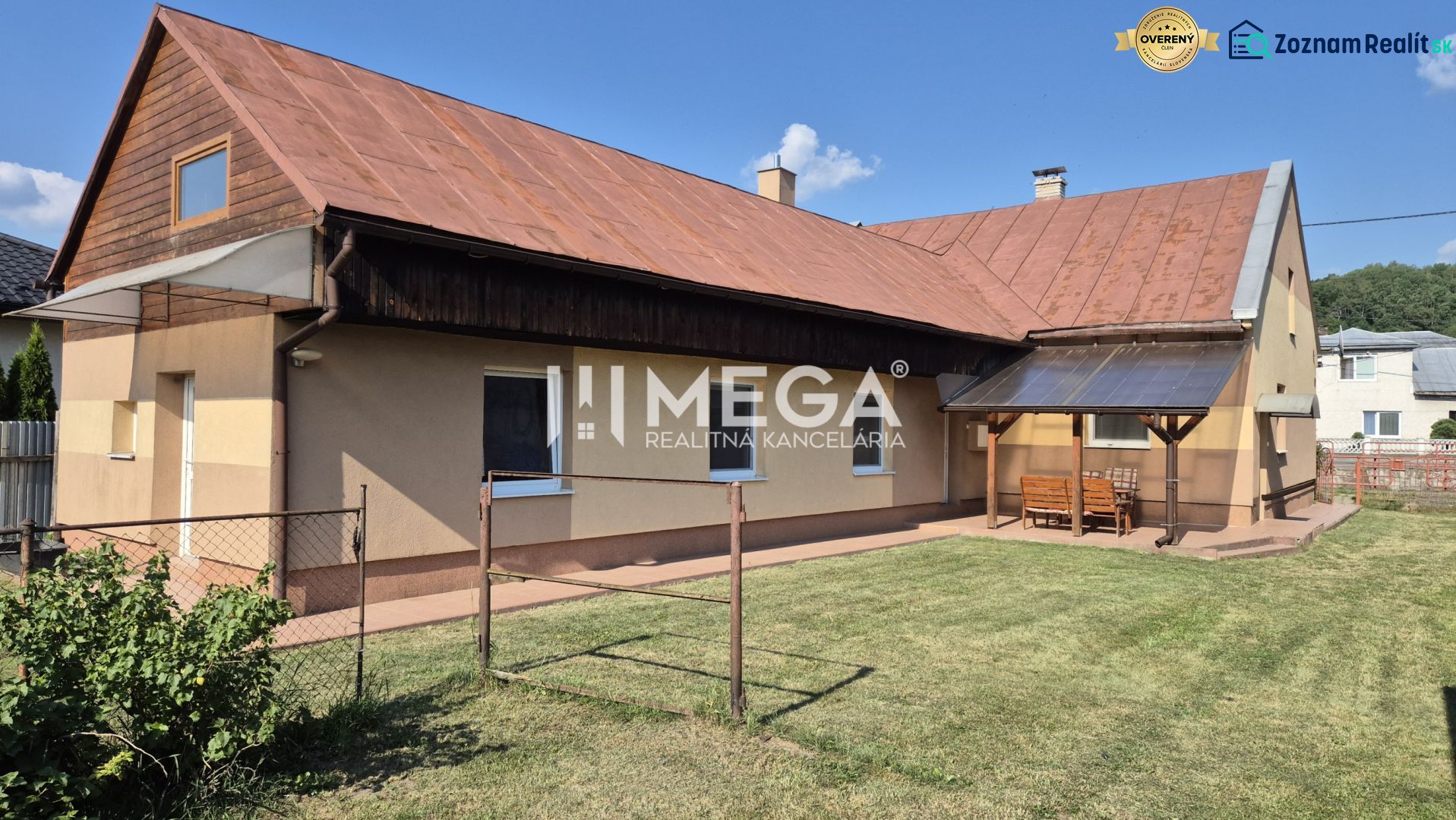 A family house in Krásny Brod with a front garden and a covered terrace.