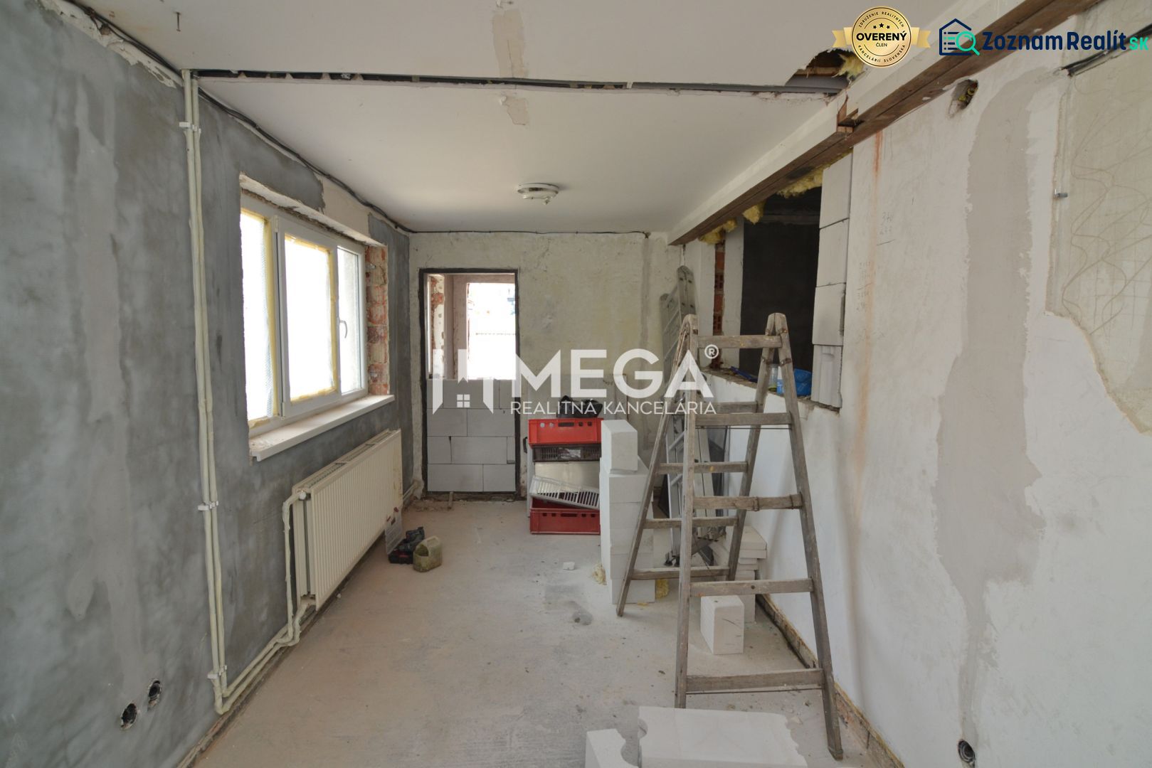 Production facilities with incomplete reconstruction, ladder and blocks, floor with wooden decor.